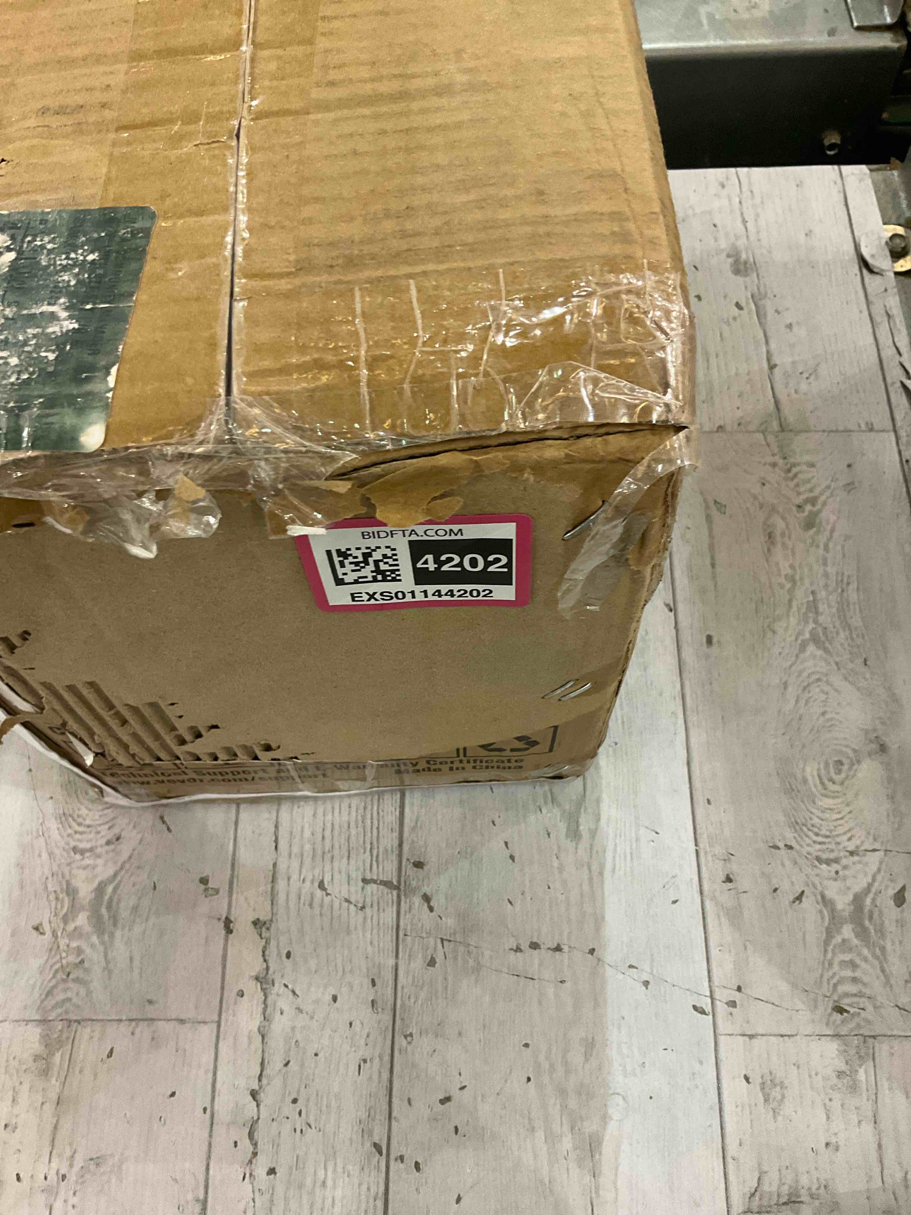 https://s3.amazonaws.com/lotting-images-prod/bidfta/EXS01144202_1707927151322.jpeg