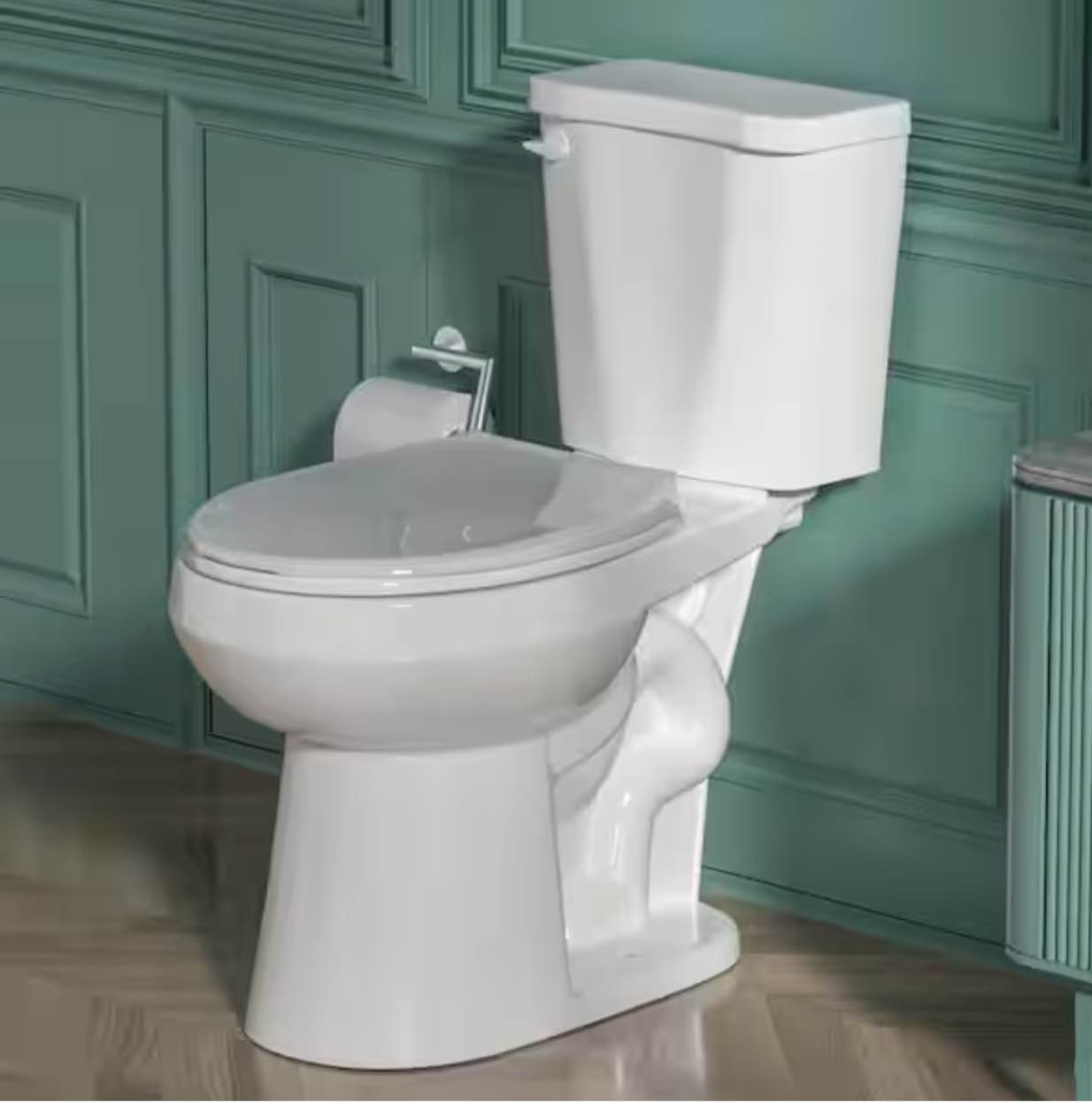 Two-Piece 1.28 GPF Single Flush Elongated Toilet in White Seat Included *similar to stock photo *