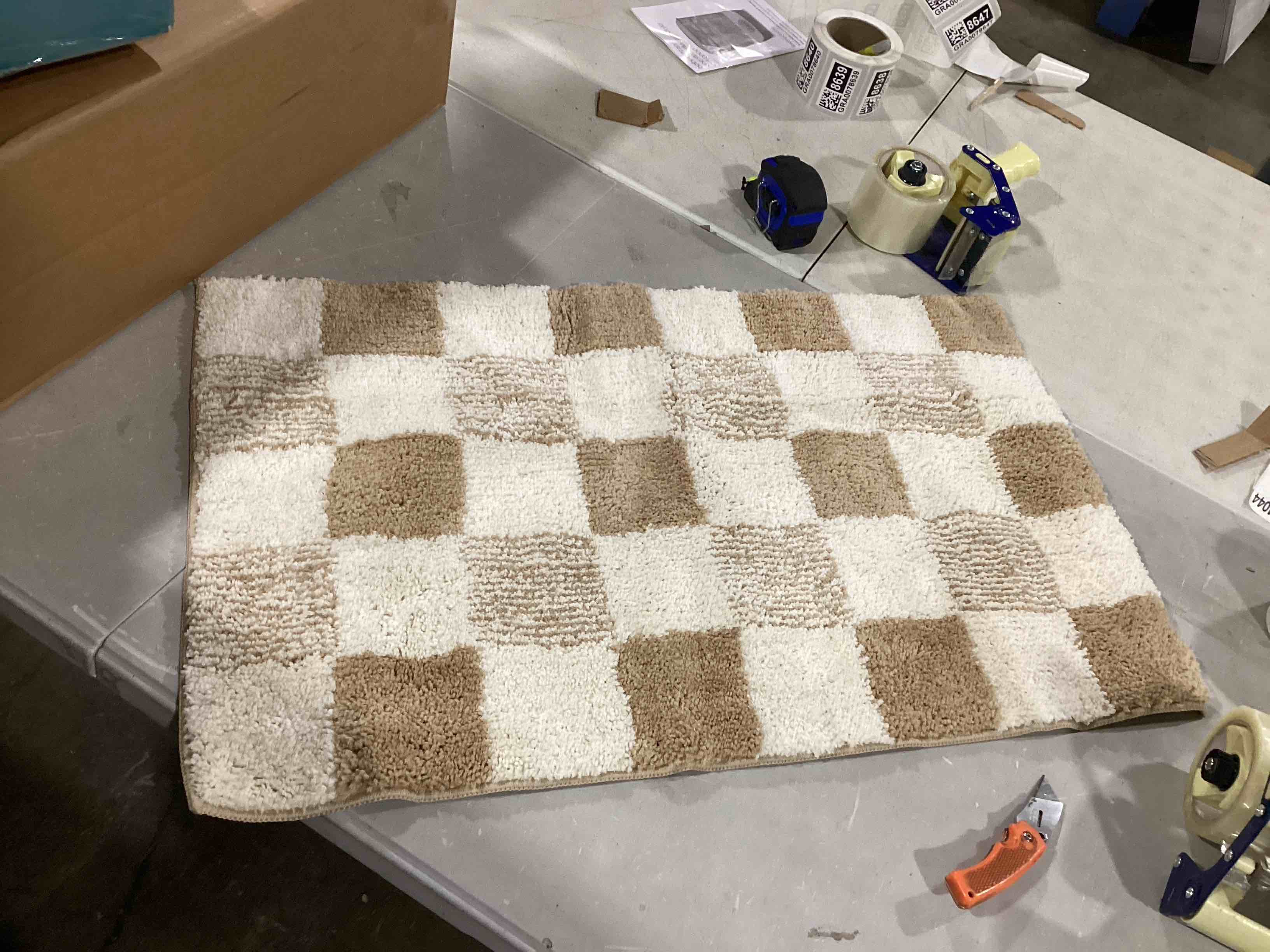 32”x20” tan plaid floor mat 