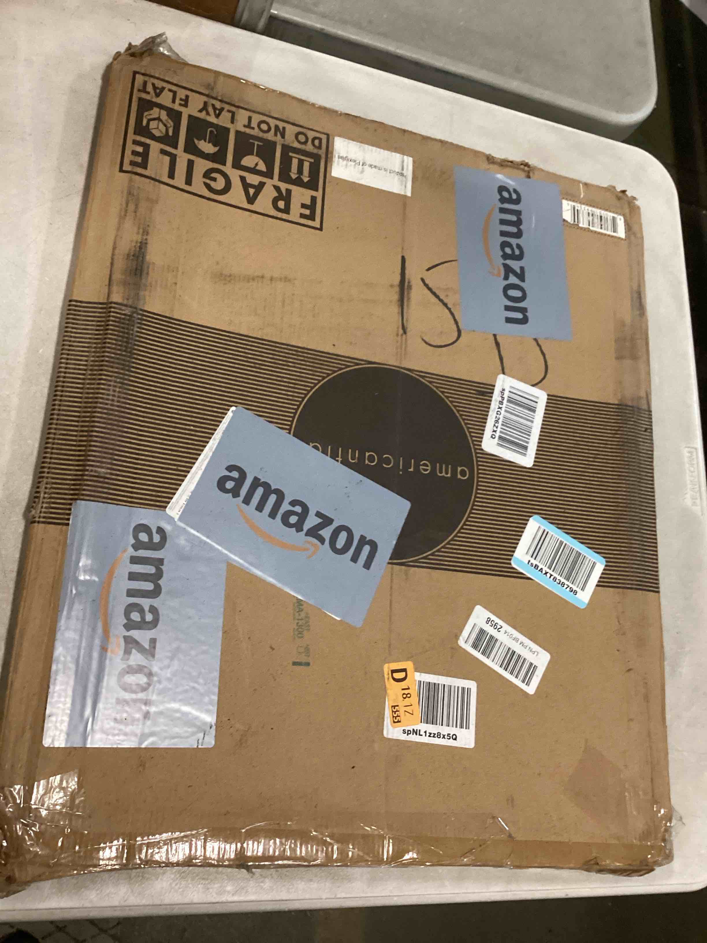 https://s3.amazonaws.com/lotting-images-prod/bidfta/GRA0167697_1728085828964.jpeg
