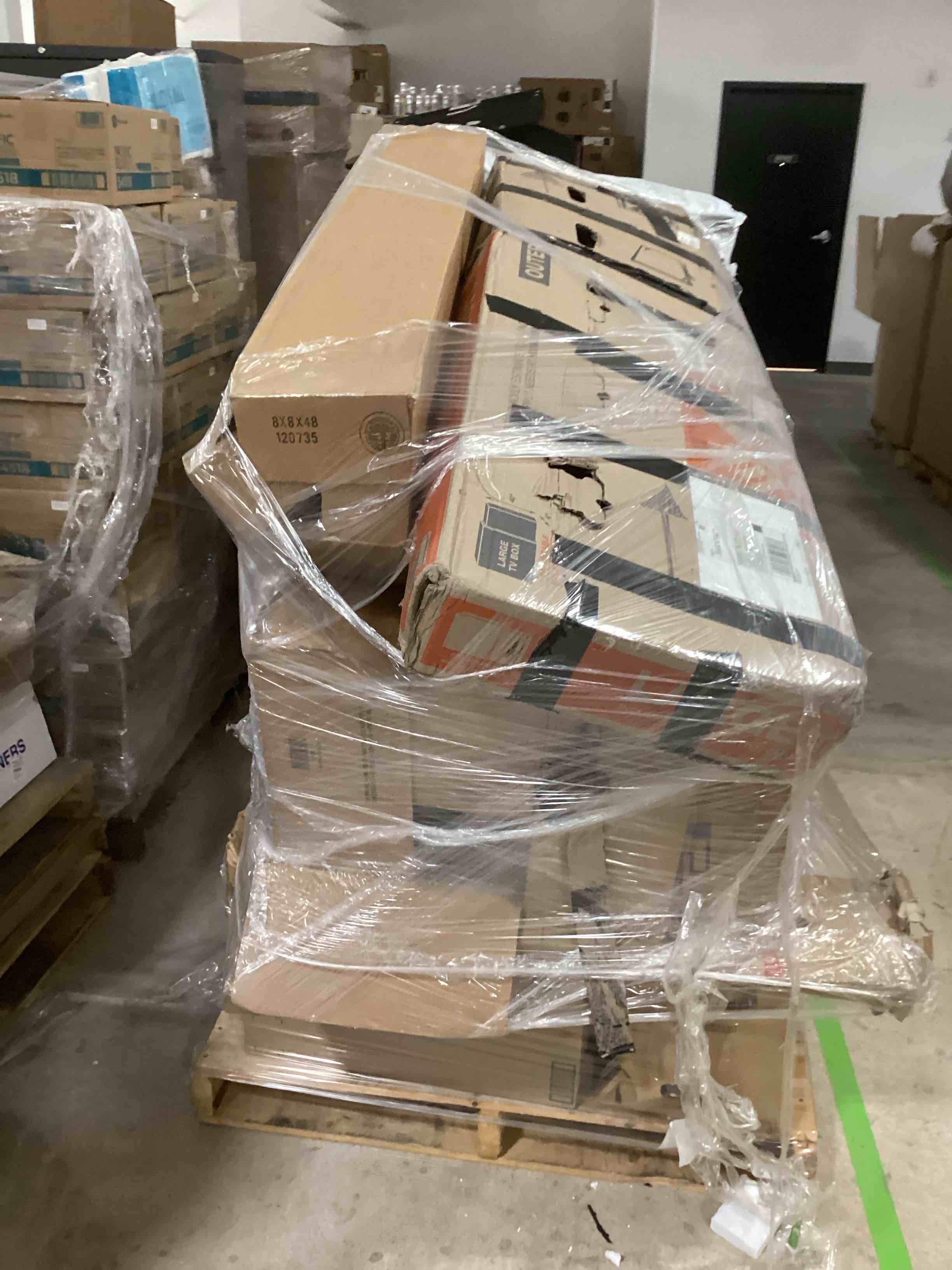 Pallet Lot of Mysterious Boxes. Fans, Furniture And More 