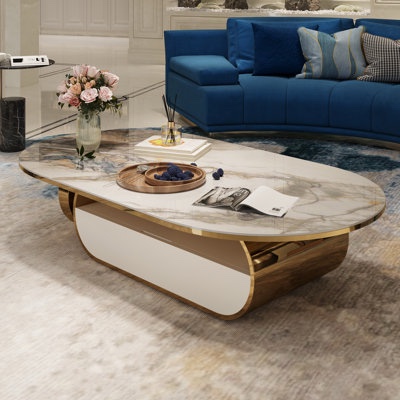 alandra gold finish premium marble oval table with gold trim and a drawer