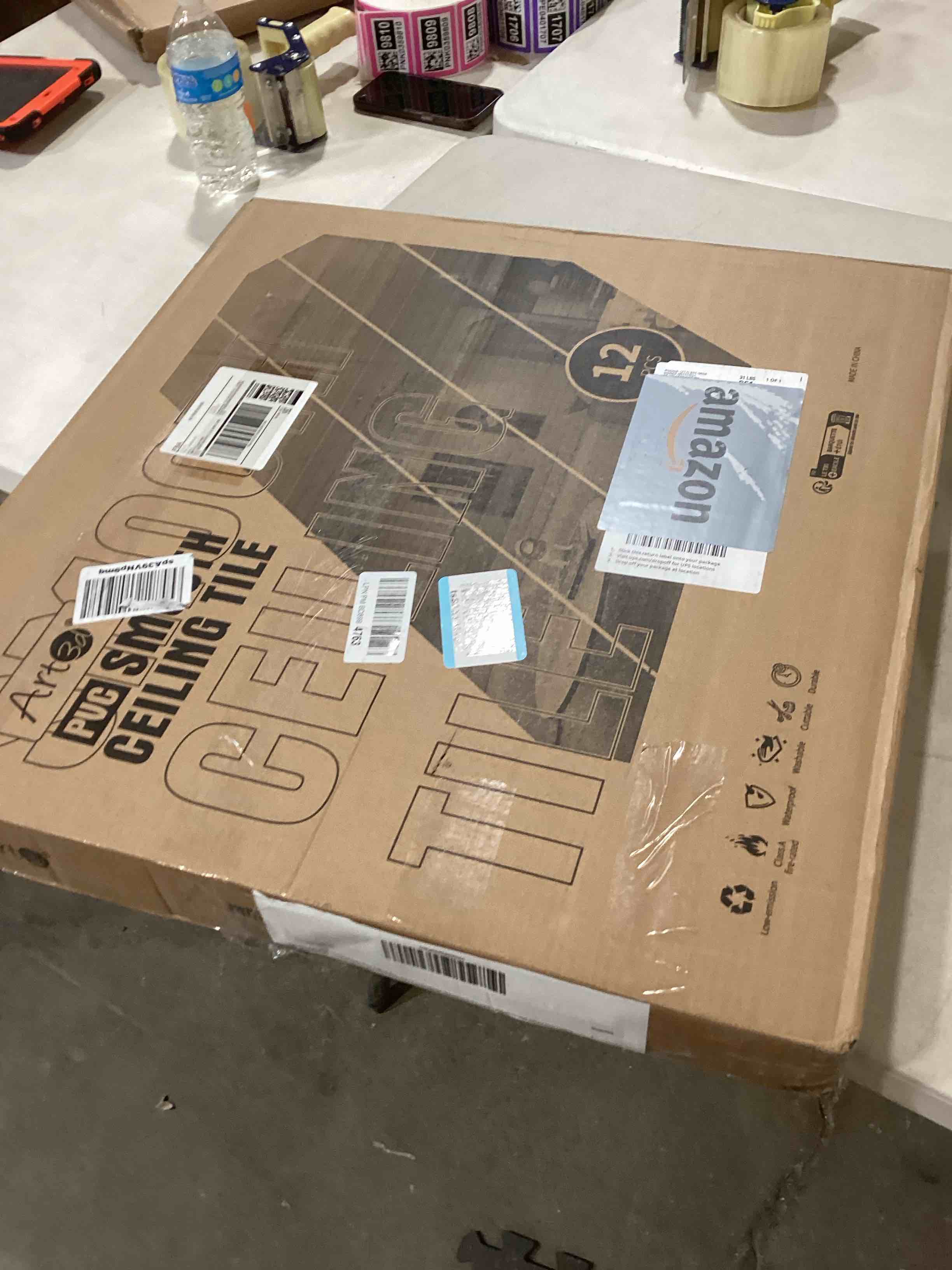 Art3d 12-Pack Stucco Texture Drop Ceiling Tiles 2x2 FT - Fire-Rated, Waterproof, Reusable - Premium PVC 24x24 Inch Ceiling Panels for Living Room Kitchen Bathroom Basement Office, White