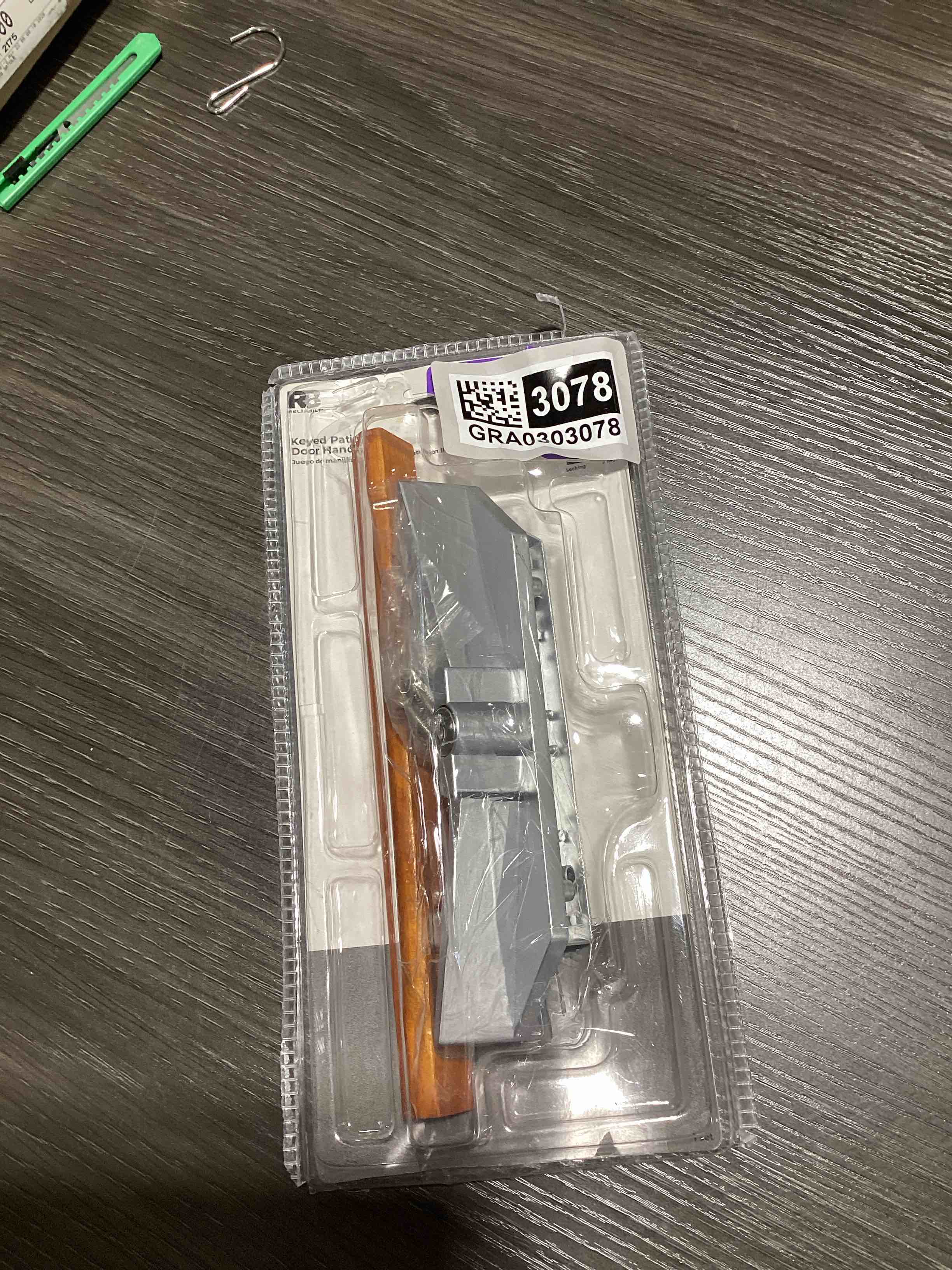 Condition photo showing Good Condition for mortise style reversible sliding patio door handle set with oak wood interior handle and exterior pull in white diecast finish fits 3-15/16” screw hole spacing, non-keyed with latch locks (white)