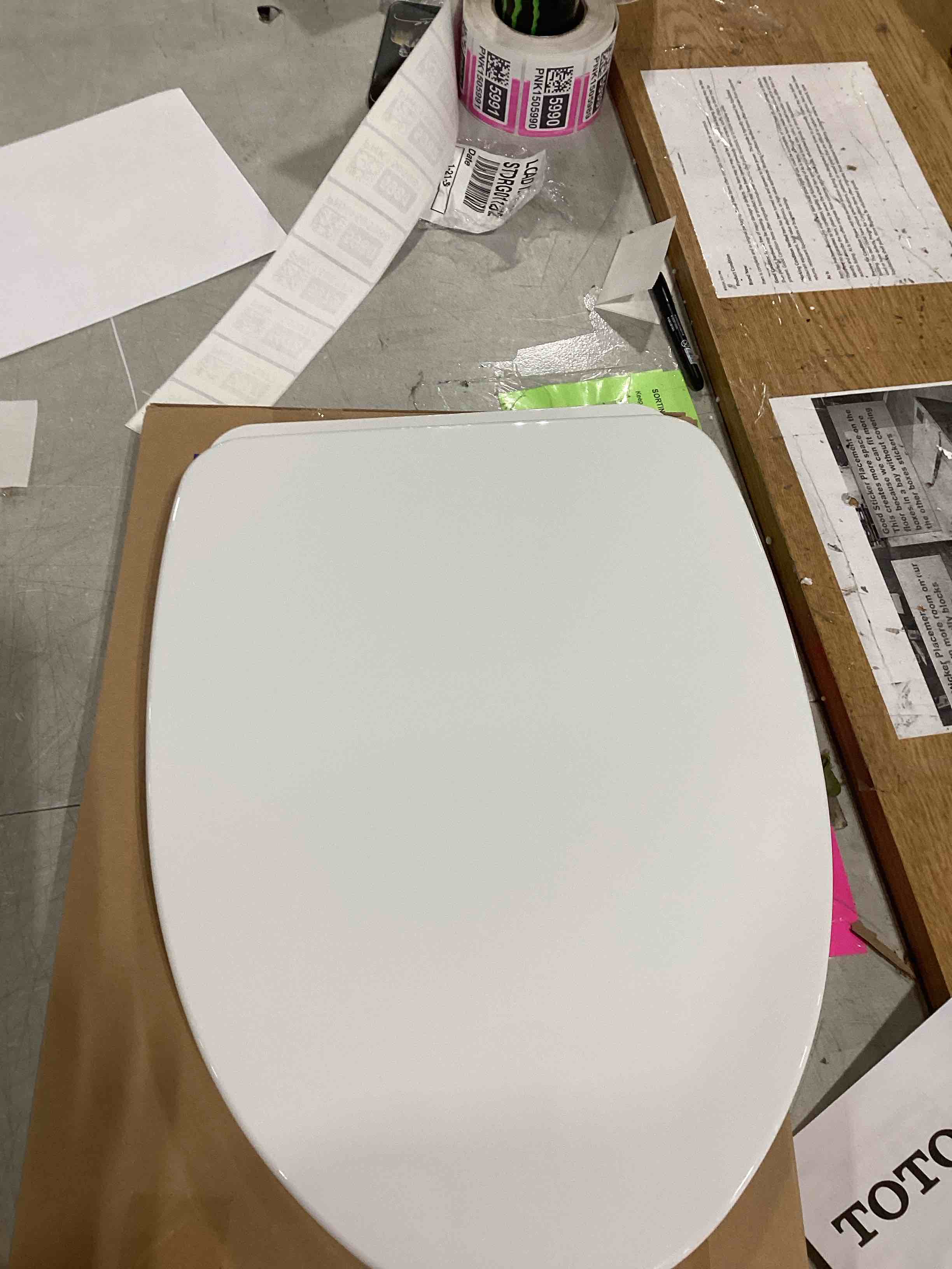 Condition photo showing As Is for aquia® dual-flush elongated toilet seat with tornado flush (seat included)