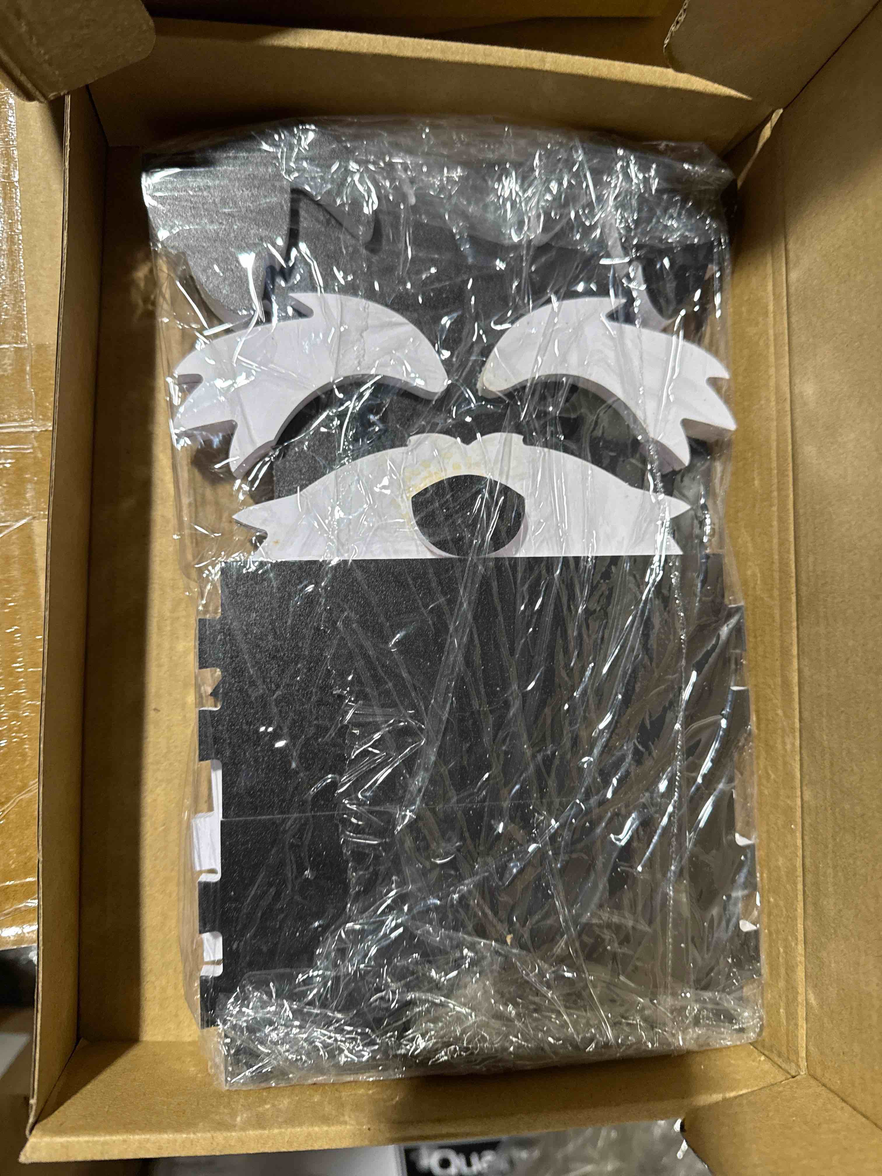 Condition photo showing item condition for wooden dog planter black/ white