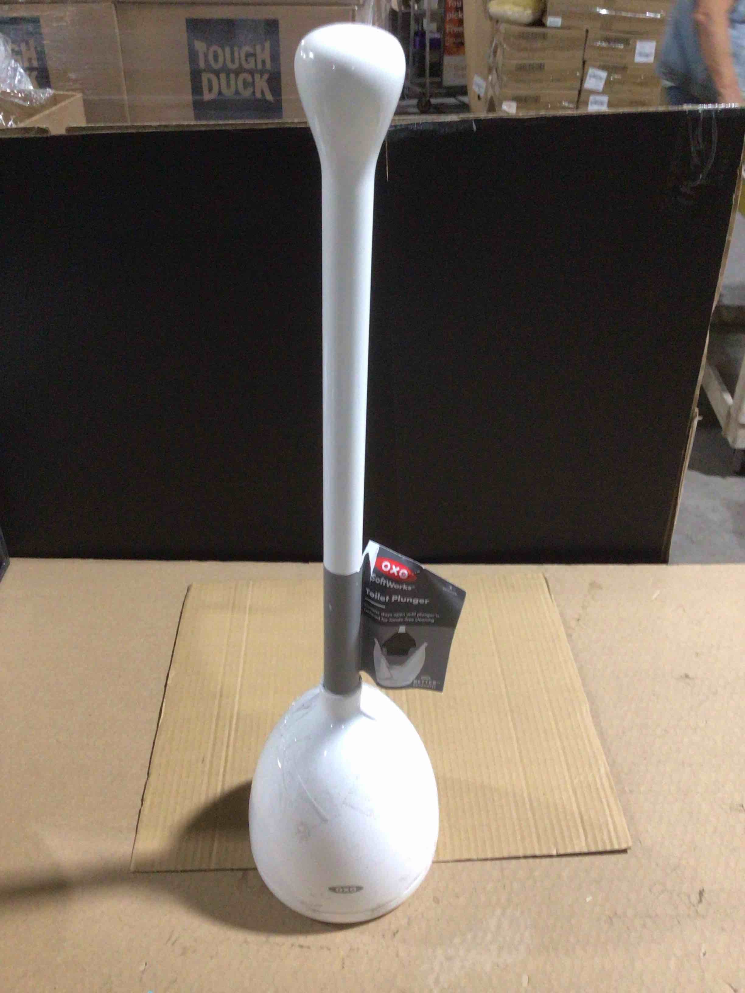 Condition photo showing As Is for oxo toilet plunger and canister