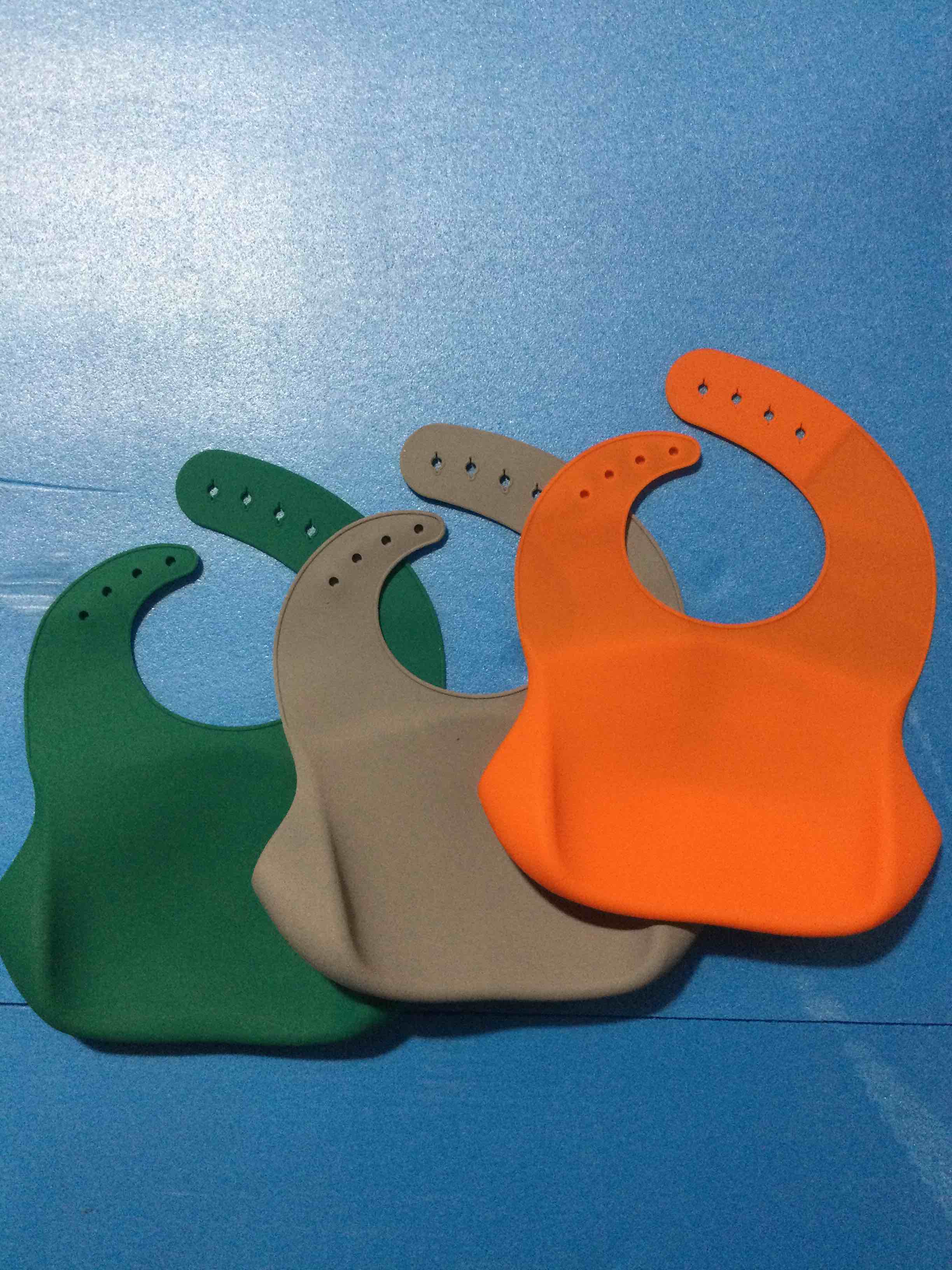 Condition photo showing New/Like New for Baby Silicone Bibs, 1 Grey, 1 orange & 1 green