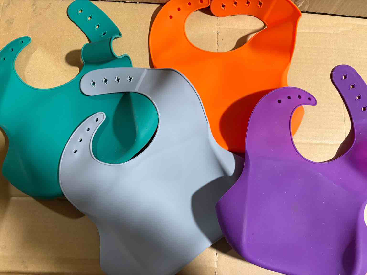 Condition photo showing New/Like New for Baby Silicone Bibs, 1 Grey, 1 Purple & 1 Green 
