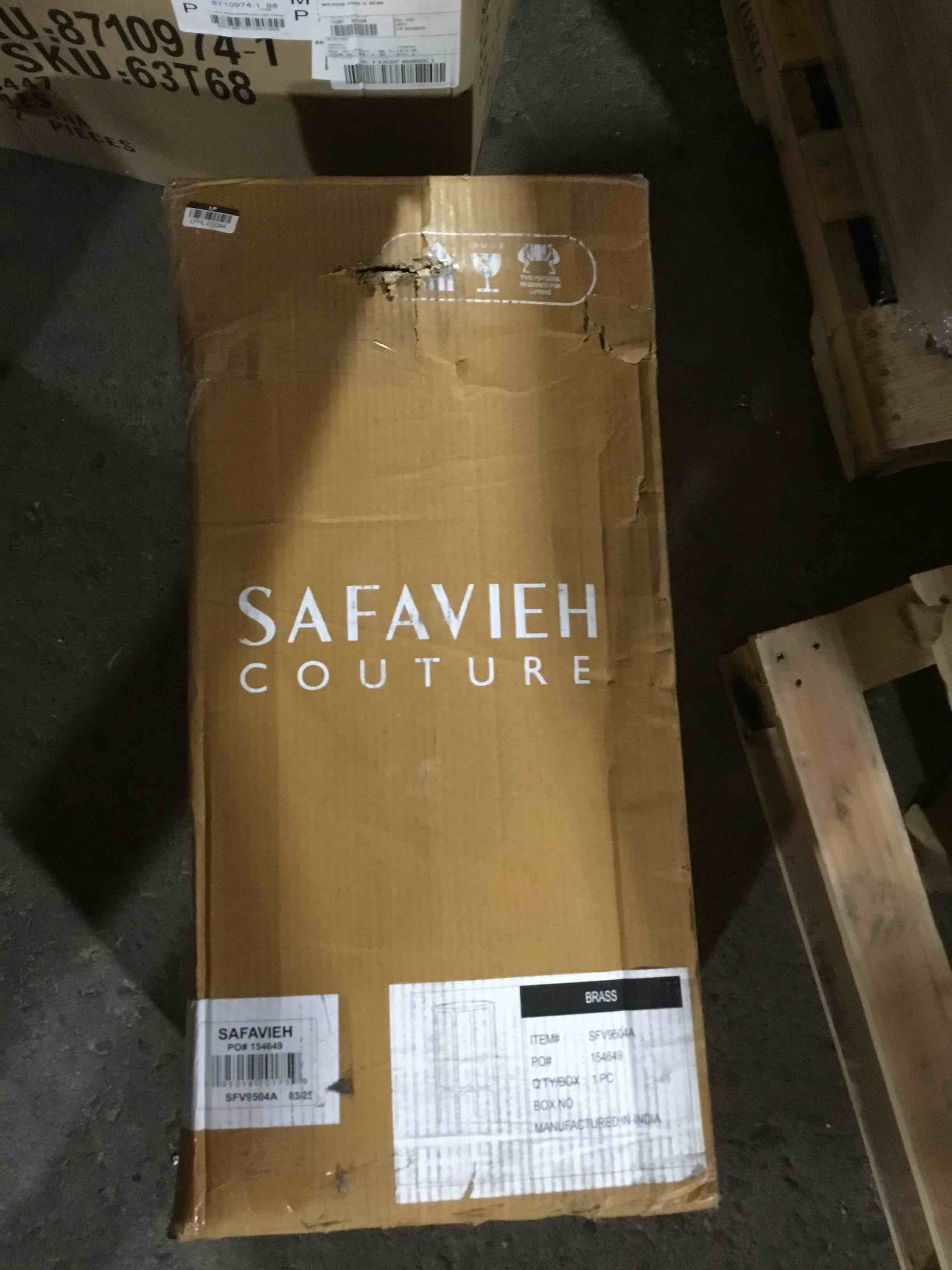 Condition photo showing New/Like New for SAFAVIEH Couture Home Collection Jessa Brass Metal/Tempered Glass Top Tall Round End Table (Fully Assembled)