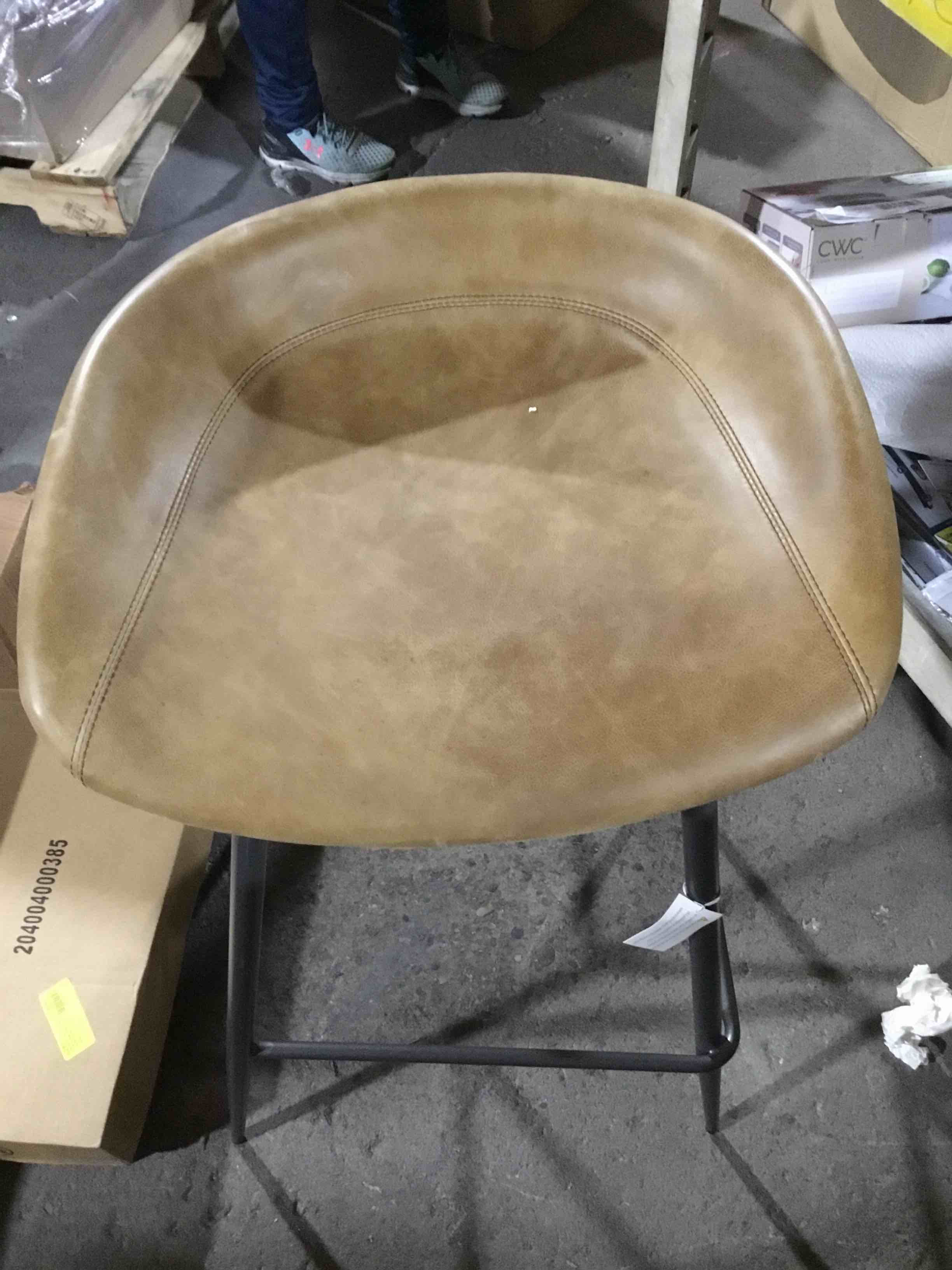 Condition photo showing New/Like New for Bar stool with brown faux leather seat and black metal legs