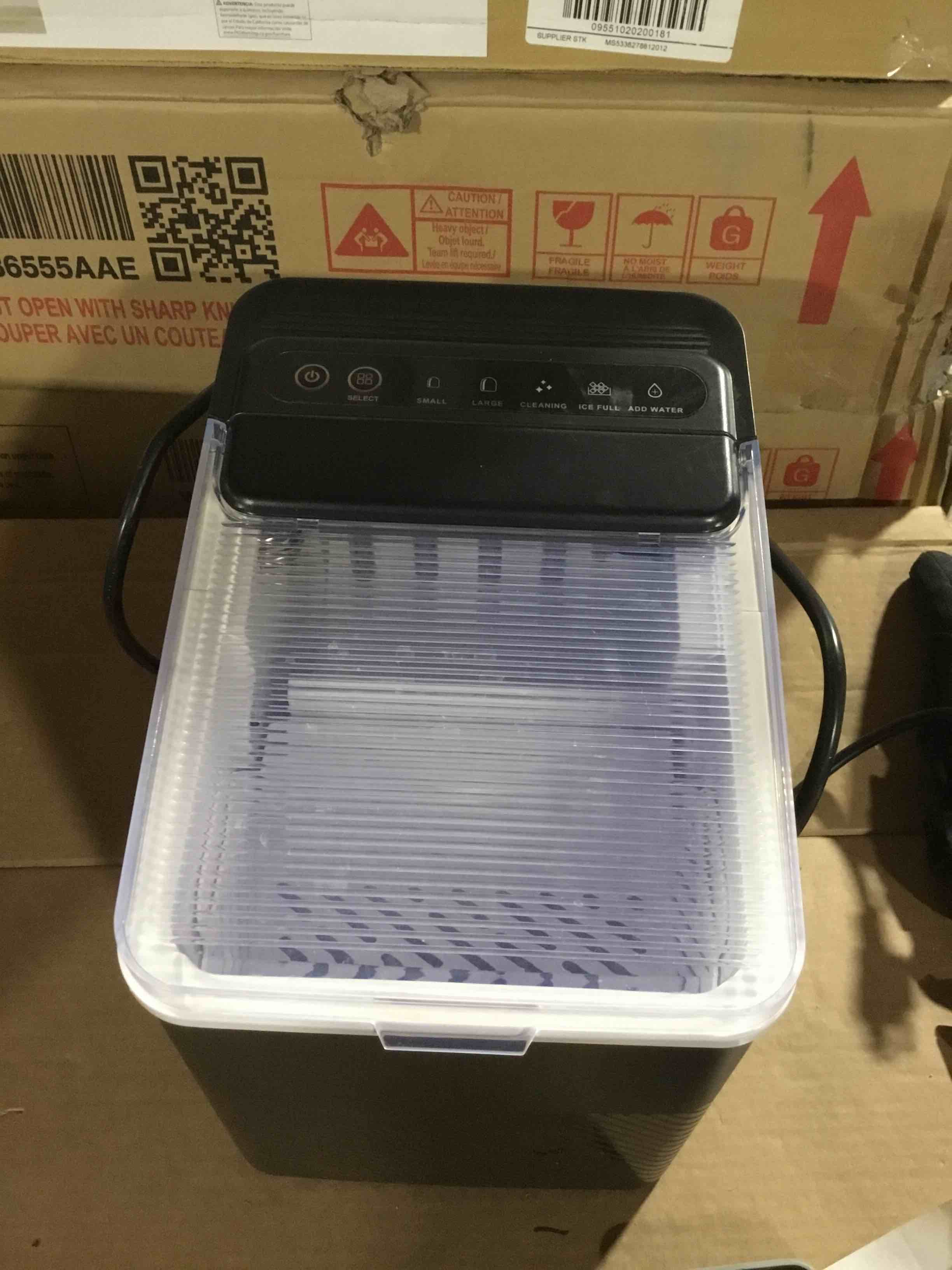 Condition photo showing As Is for Mainstays Countertop Ice Maker, Rich Black, 9 Bullet Cubes, 2 Ice Sizes, 26 lbs/24H with Removable & Washable Tray & Scoop, with Self-Cleaning Function