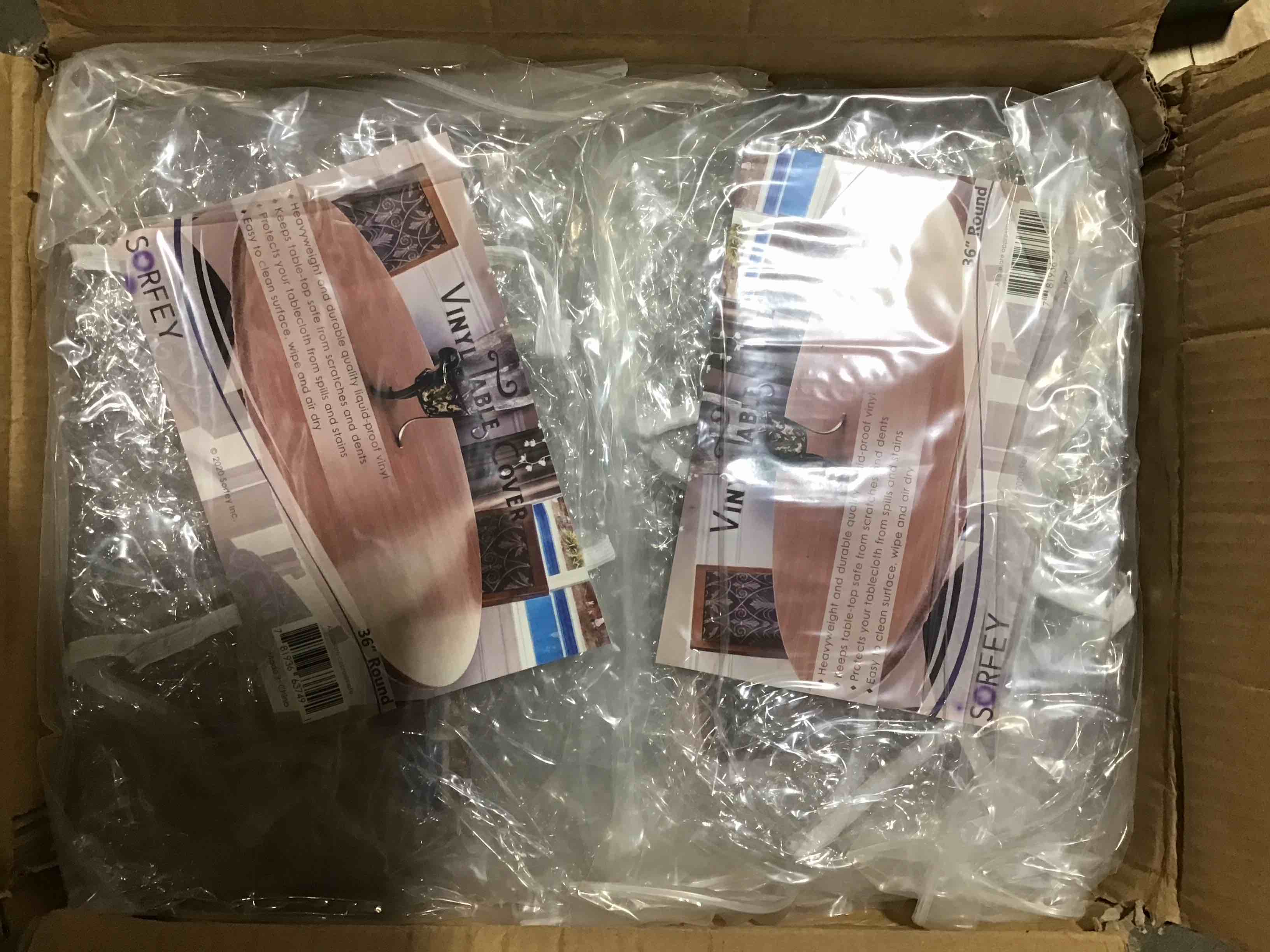 Condition photo showing New/Like New for case of 12 clear vinyl round fitted tablecloth 36 inch