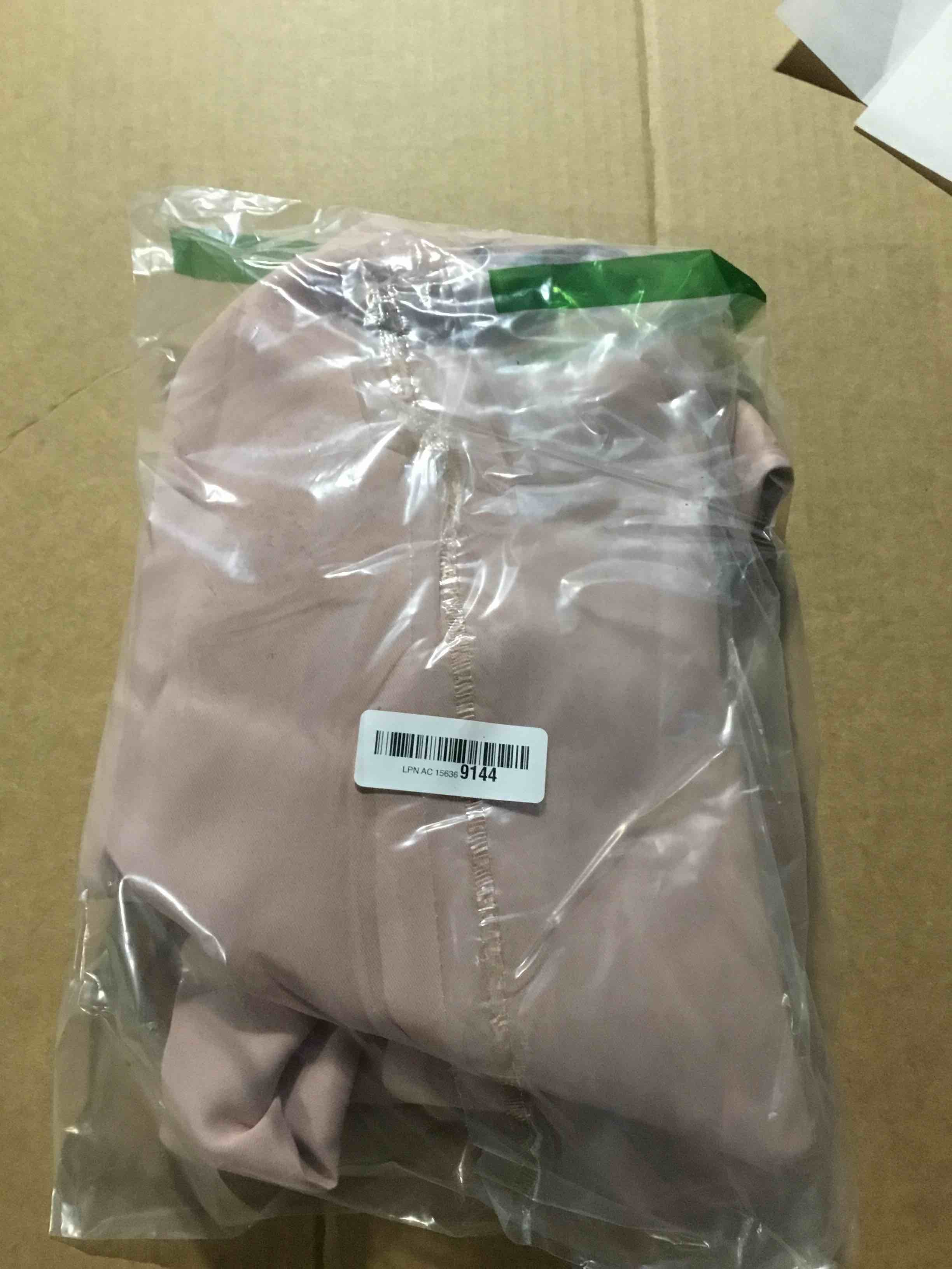 Condition photo showing New/Like New for Sun Zero Easton Energy Saving Blackout Tab Top Curtain Panel, 40" x 84", Blush Pink Blush Pink 40"W x 84"L (Pack of 1)