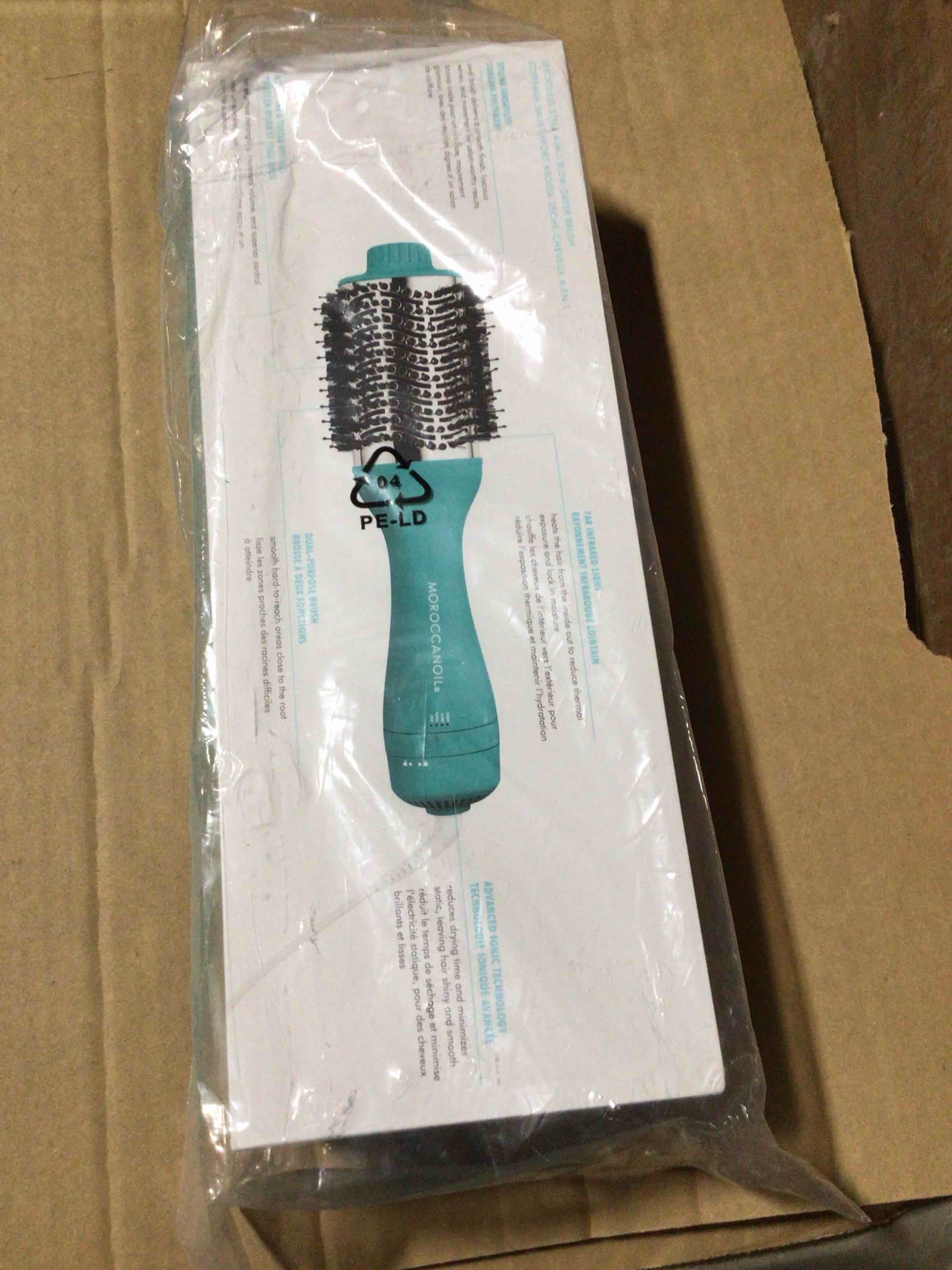 Condition photo showing New/Like New for Moroccanoil Effortless Style 4-in-1 Blow-Dryer Brush