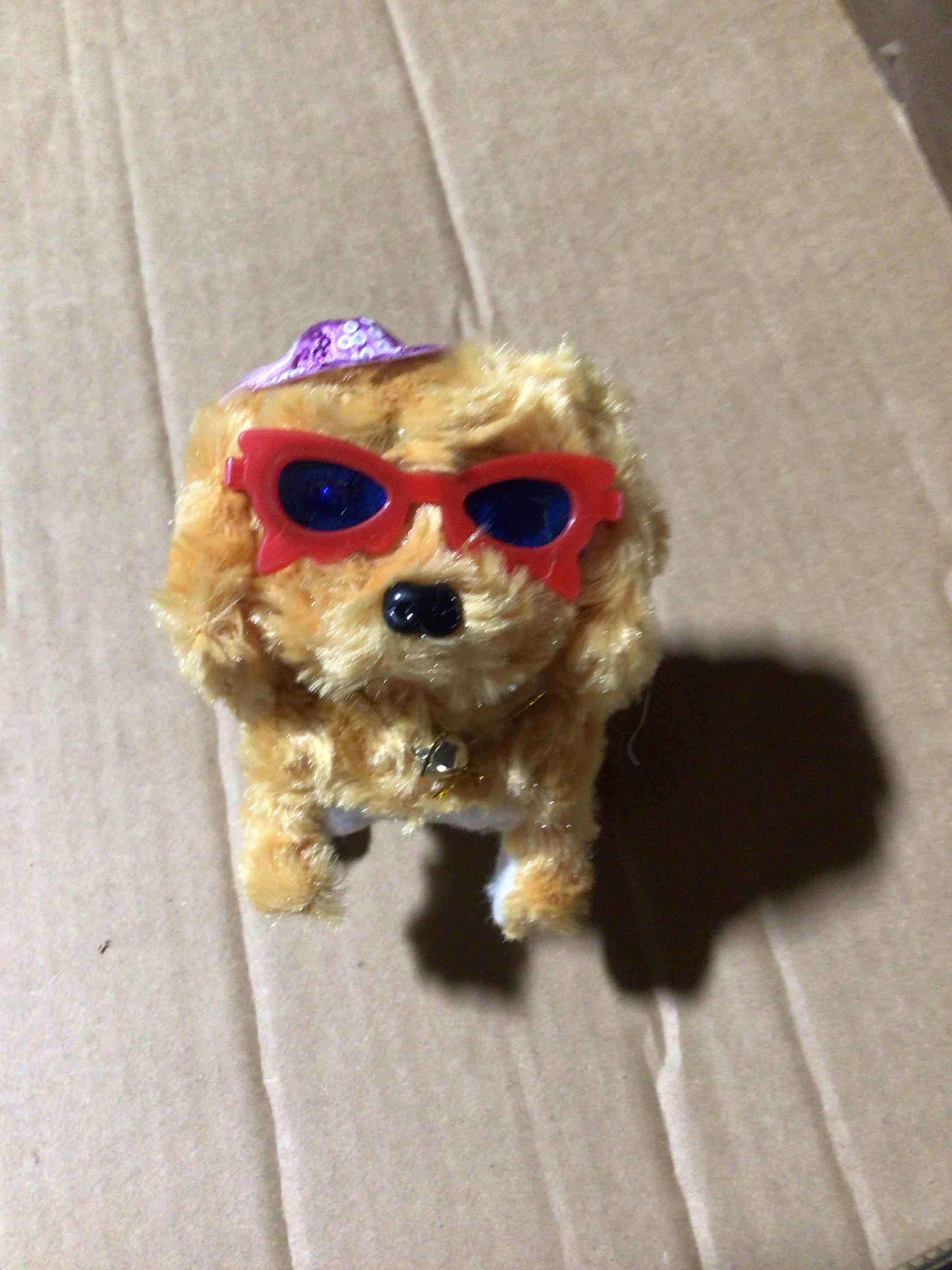 Condition photo showing Good Condition for It is an interactive stuffed toy with batteries 