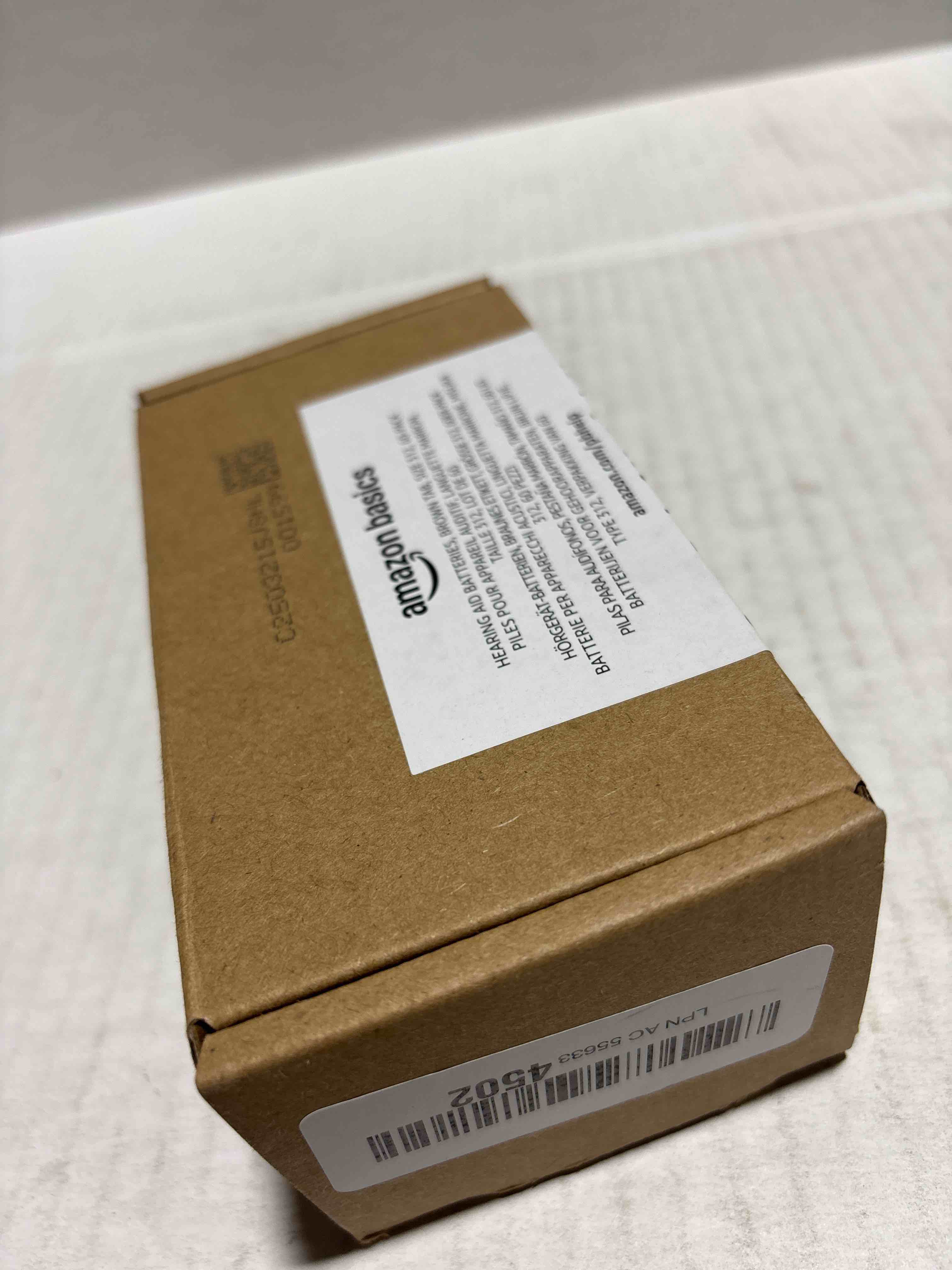 Condition photo showing New/Like New for Amazon Basics 60-Pack Hearing Aid Size 312 Zinc-Air Batteries, 1.45 Volt, Brown Tab, 4-Year Shelf Life, Child-Safe Package (Use Scissors to Open)