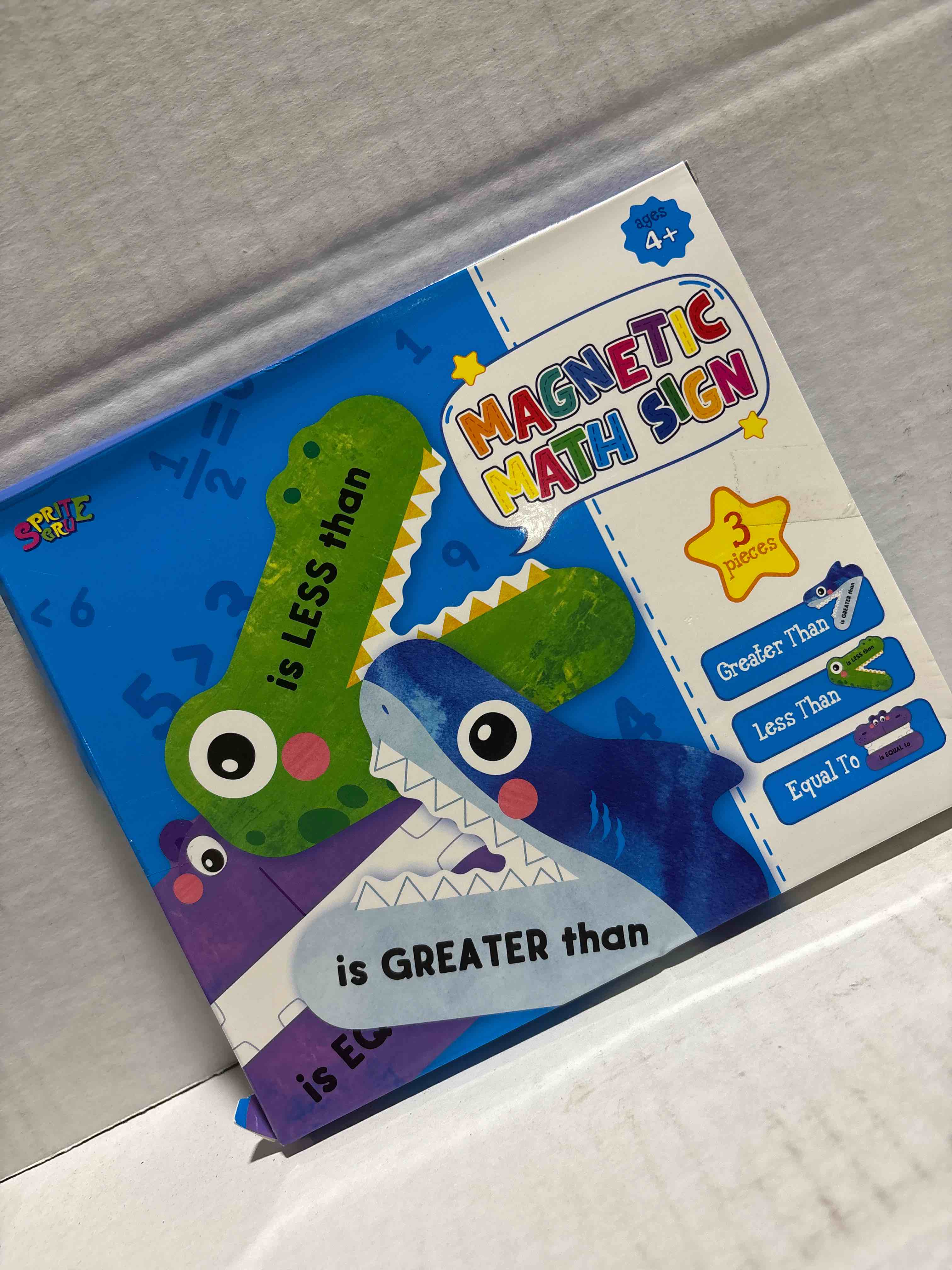 Condition photo showing New/Like New for magnetic math sign 