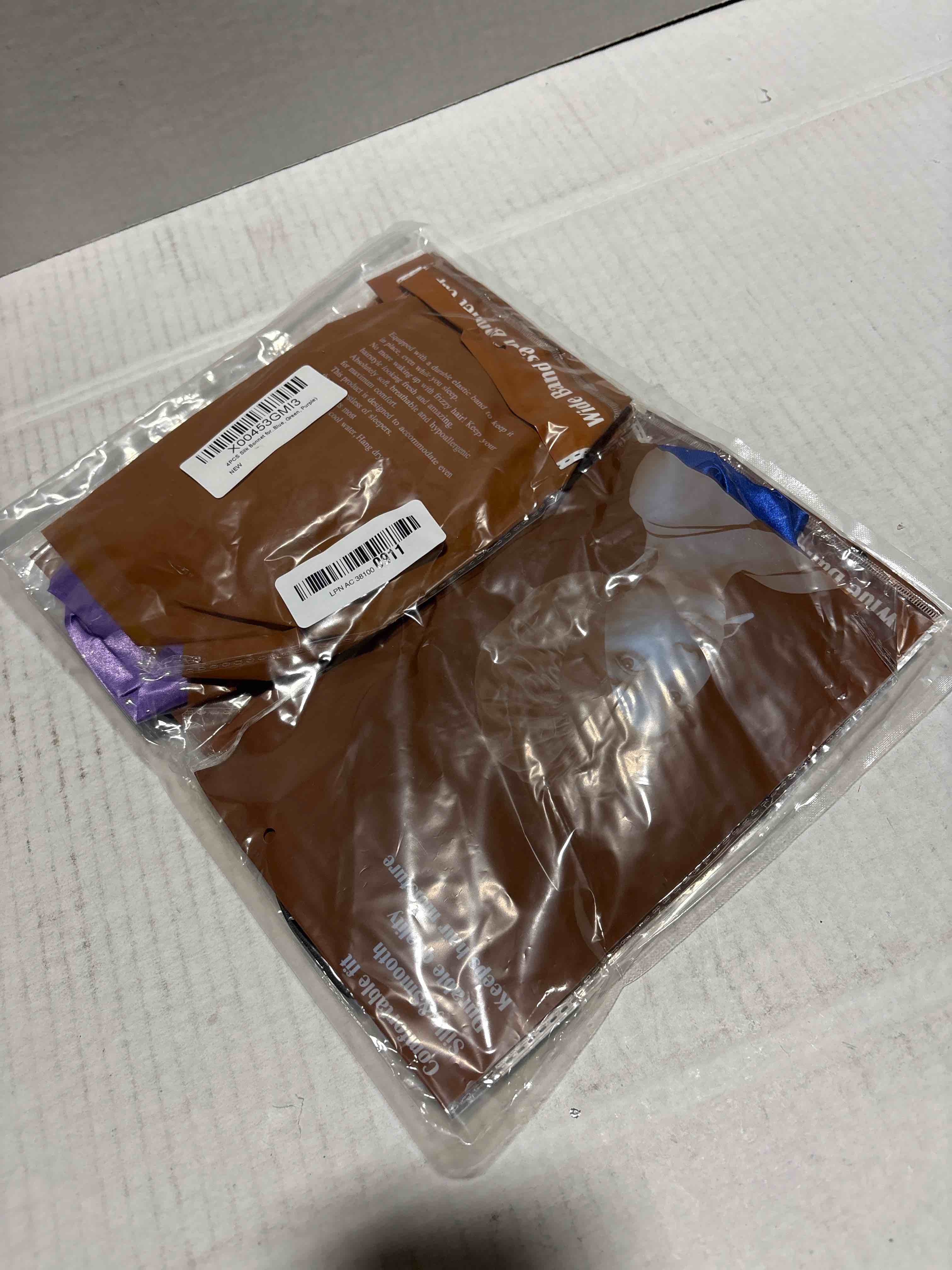 Condition photo showing New/Like New for 4PCS Silk Bonnet for Sleeping - Satin Hair Wrap Cap for Black Women Men, Curly Hair - Elastic Wide Band Shower Cap (Black, Sapphire Blue, Green, Purple) Black & Sapphire Blue & Green & Purple