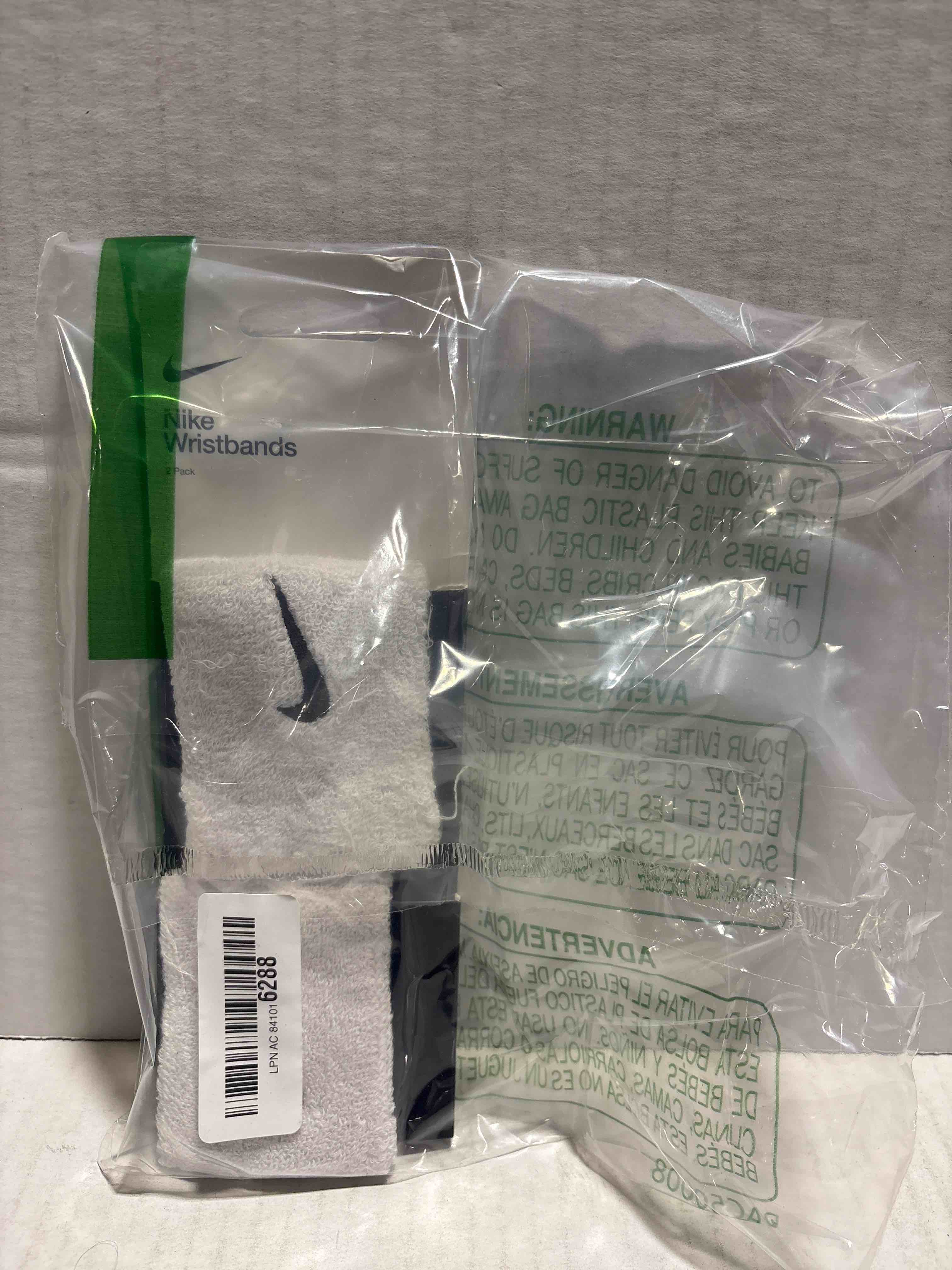 Condition photo showing New/Like New for Nike Swoosh Wristbands White One Size