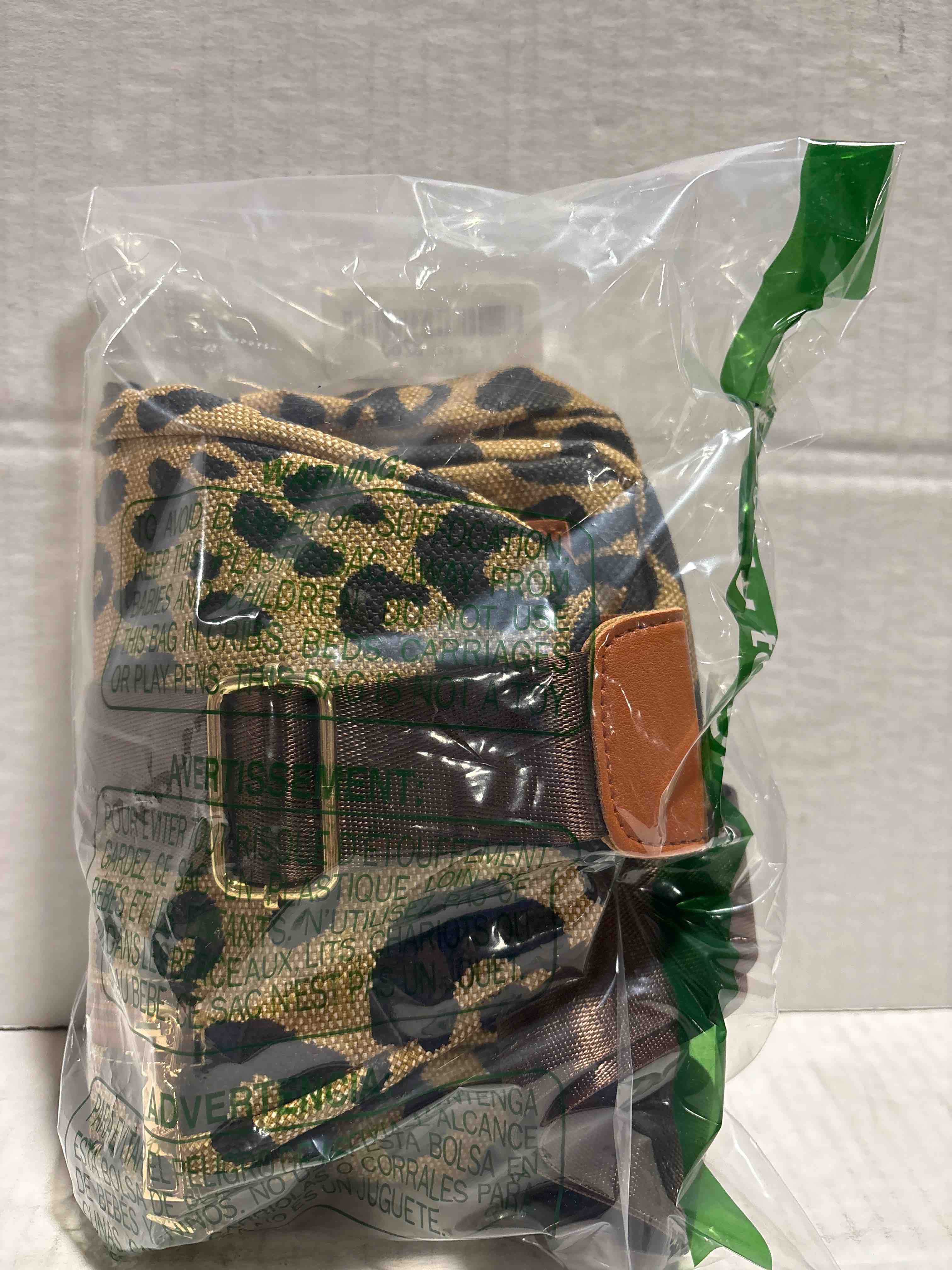 Condition photo showing New/Like New for Leopard Print Chest Bag for Women Letter Print Crossbody Sling Backpack with Wide Strap Multipurpose Fanny Daypack (leopard print)