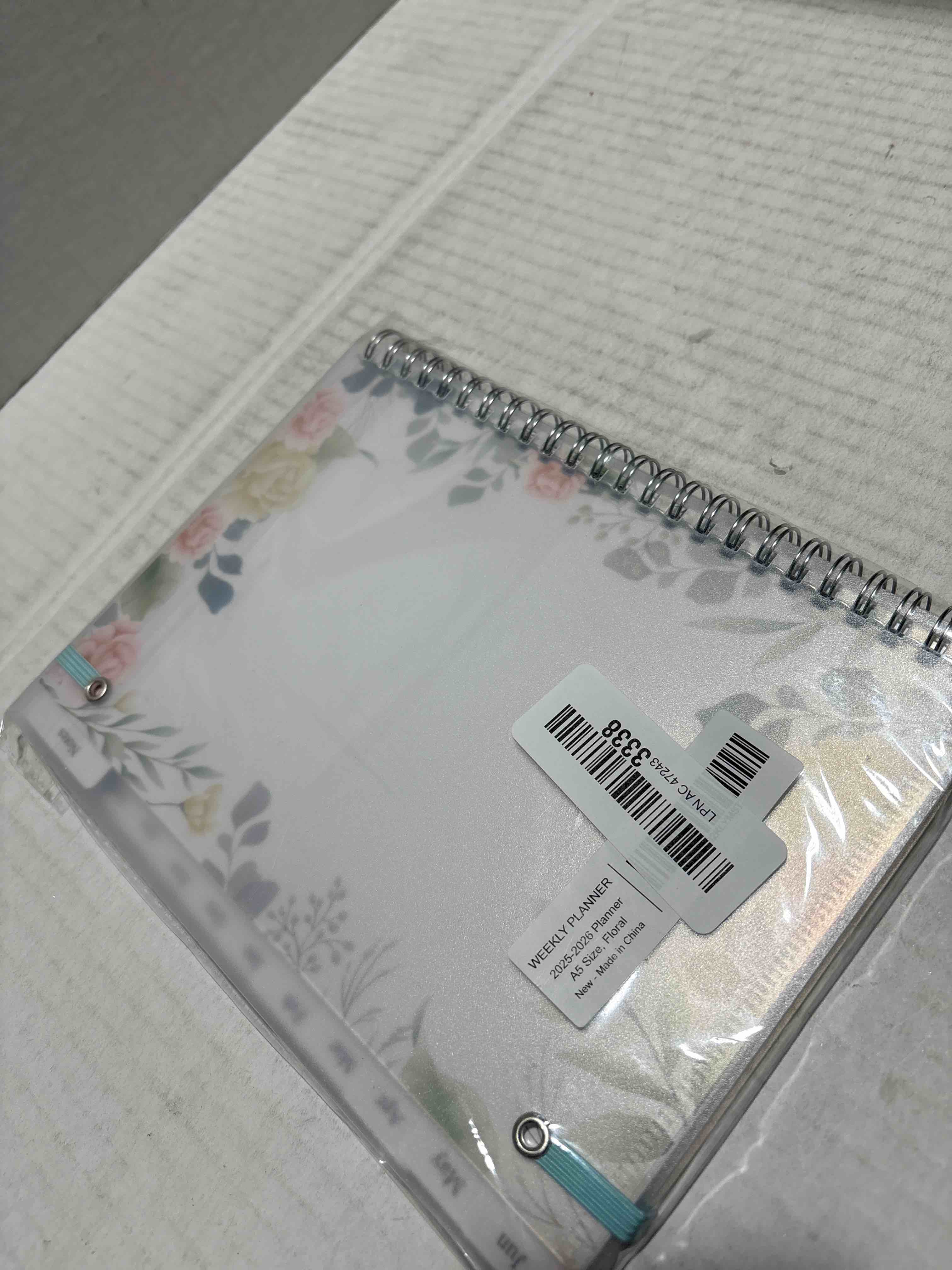 Condition photo showing New/Like New for Planner 2026 - A5 Weekly & Monthly Planner Spiral Bound, January 2026 to December 2026, Planners 2026 with Flexible Cover, Tabs, Inner Pocket, 6.4" x 8.5", Teal Flowers Teal floral 6.4" x 8.5"