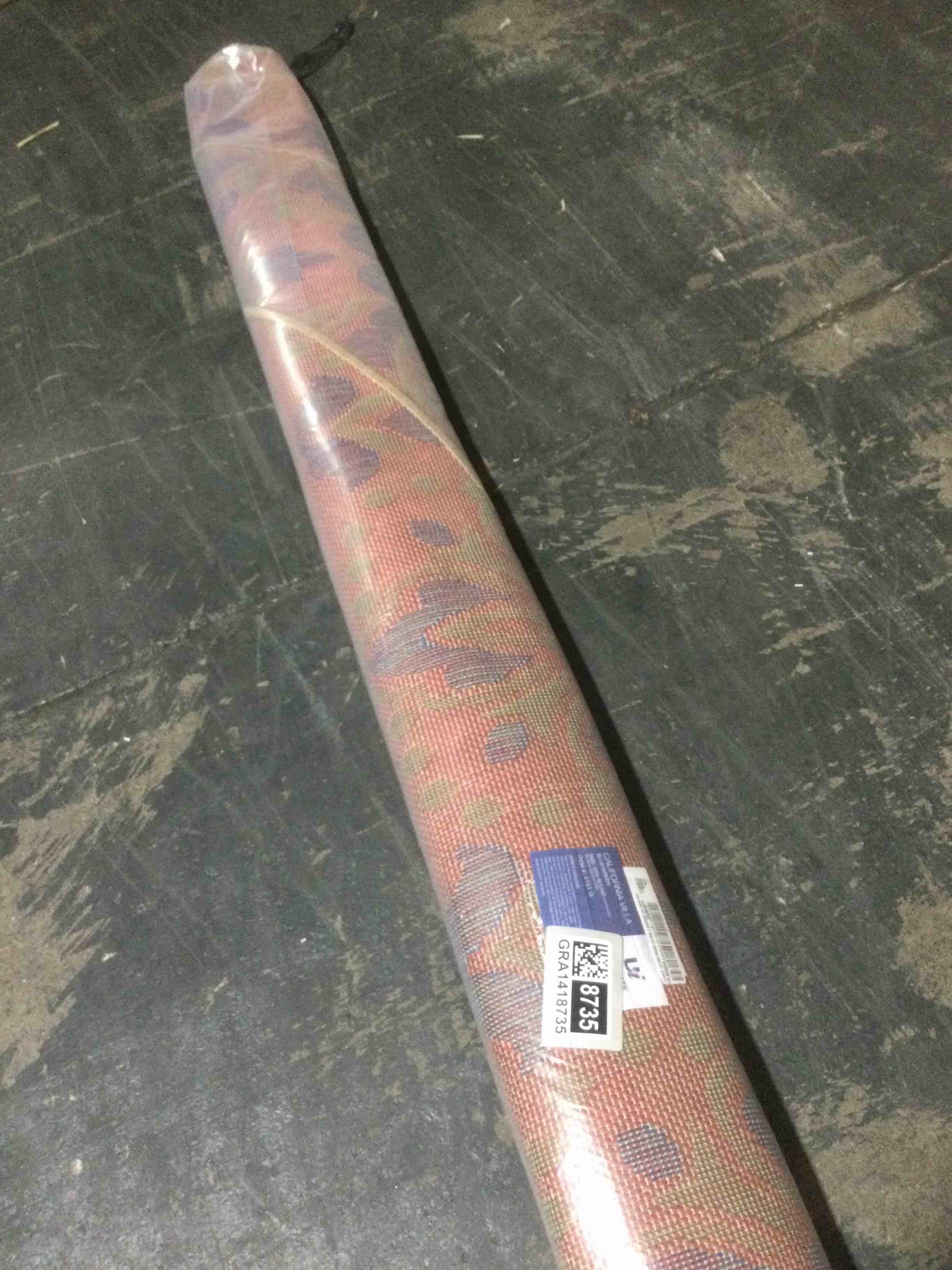 Condition photo showing New/Like New for ultimate innovations 92’ round area rug, blue/green