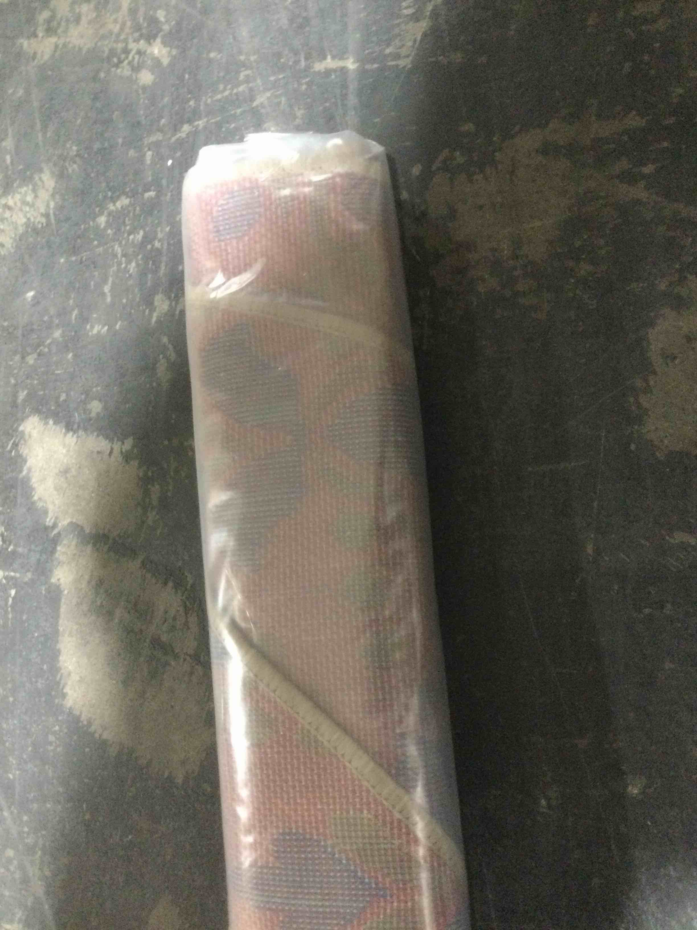 Condition photo showing New/Like New for ultimate innovations 92’ round area rug, blue/green