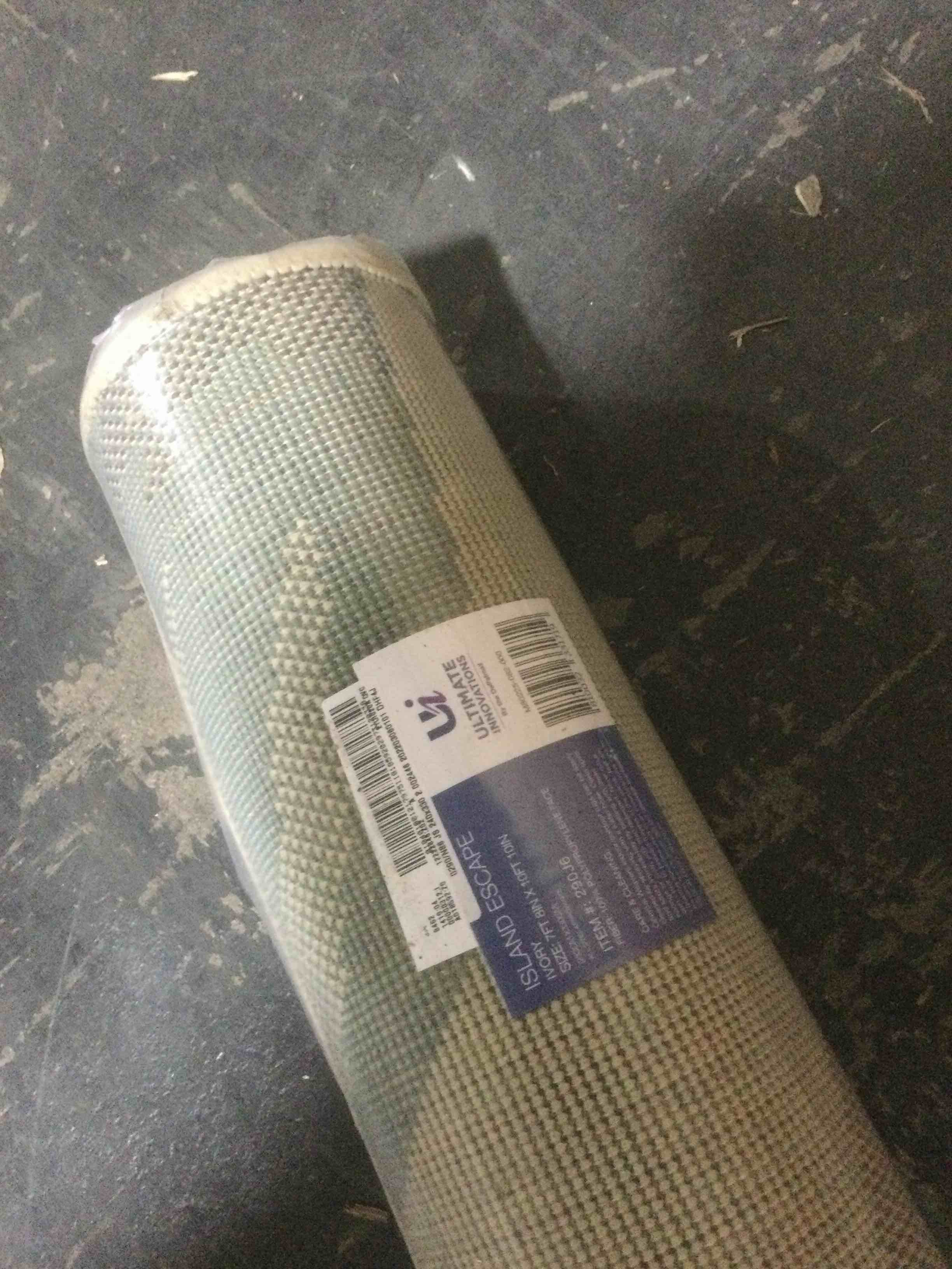 Condition photo showing New/Like New for ultimate innovations 7x10 island escape /outdoor rug, ivory