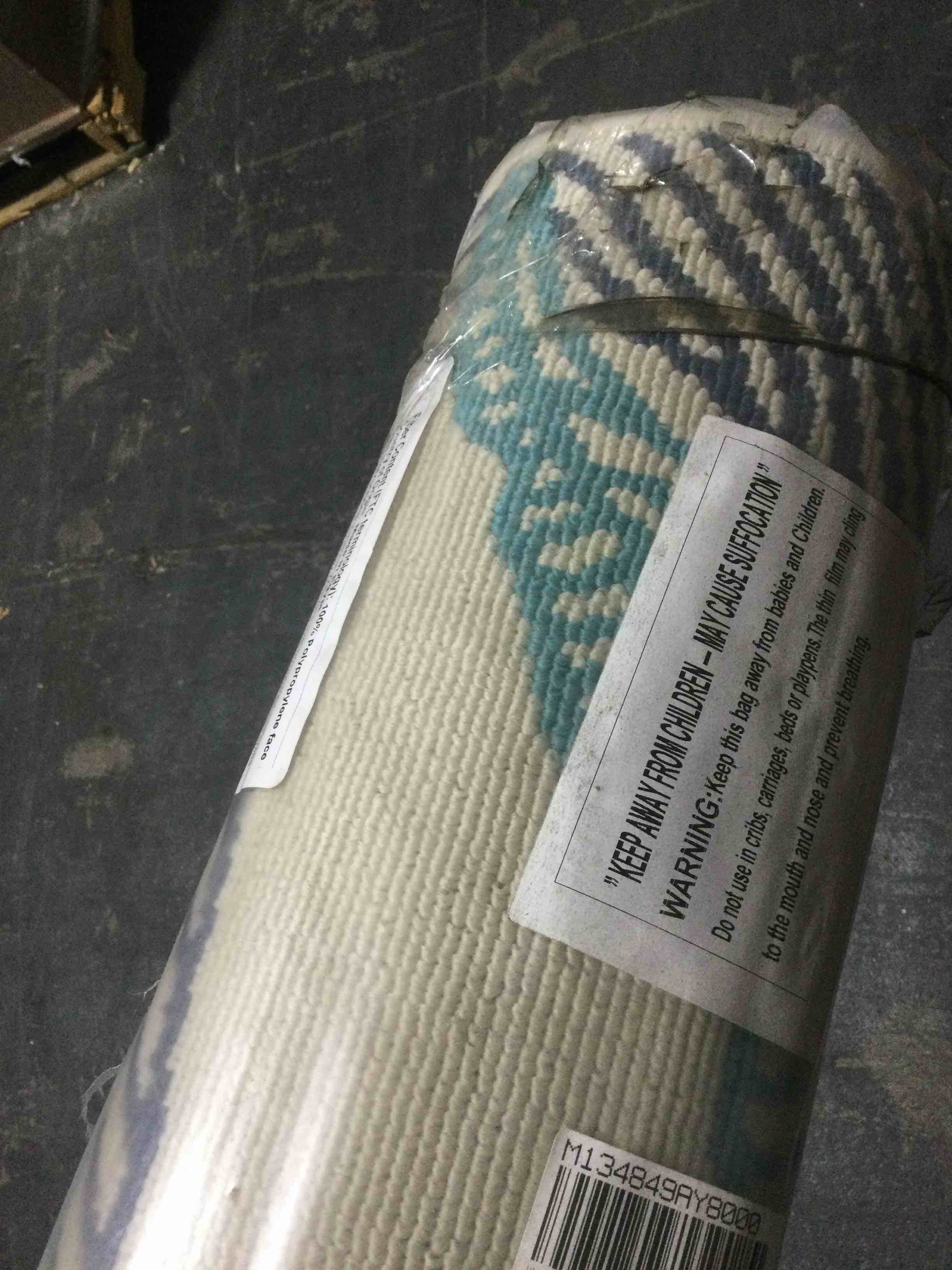 Condition photo showing New/Like New for ultimate innovations tropical palms  7’8”x10’10” rug, blue green