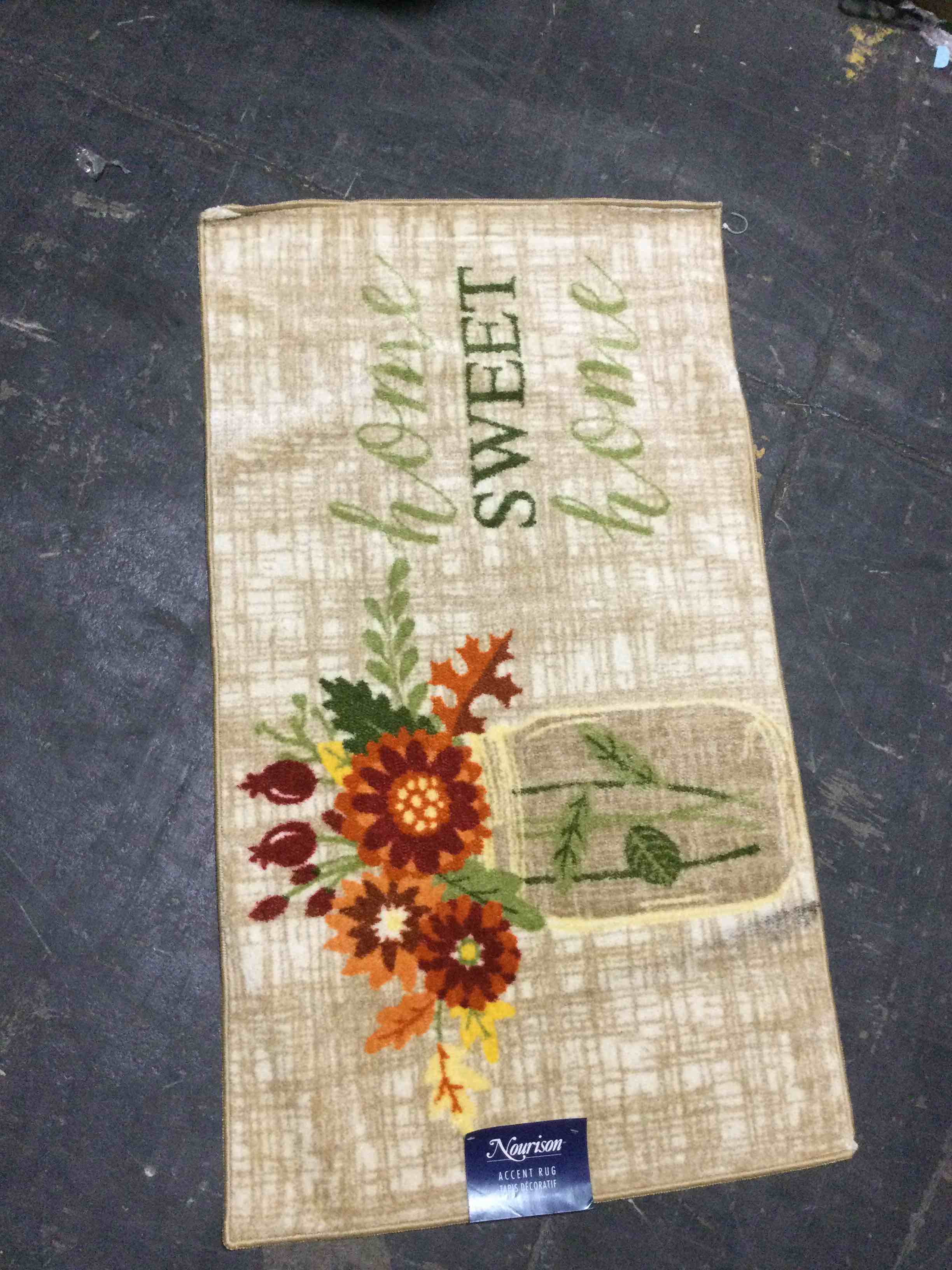 Condition photo showing New/Like New for nourison accent rug