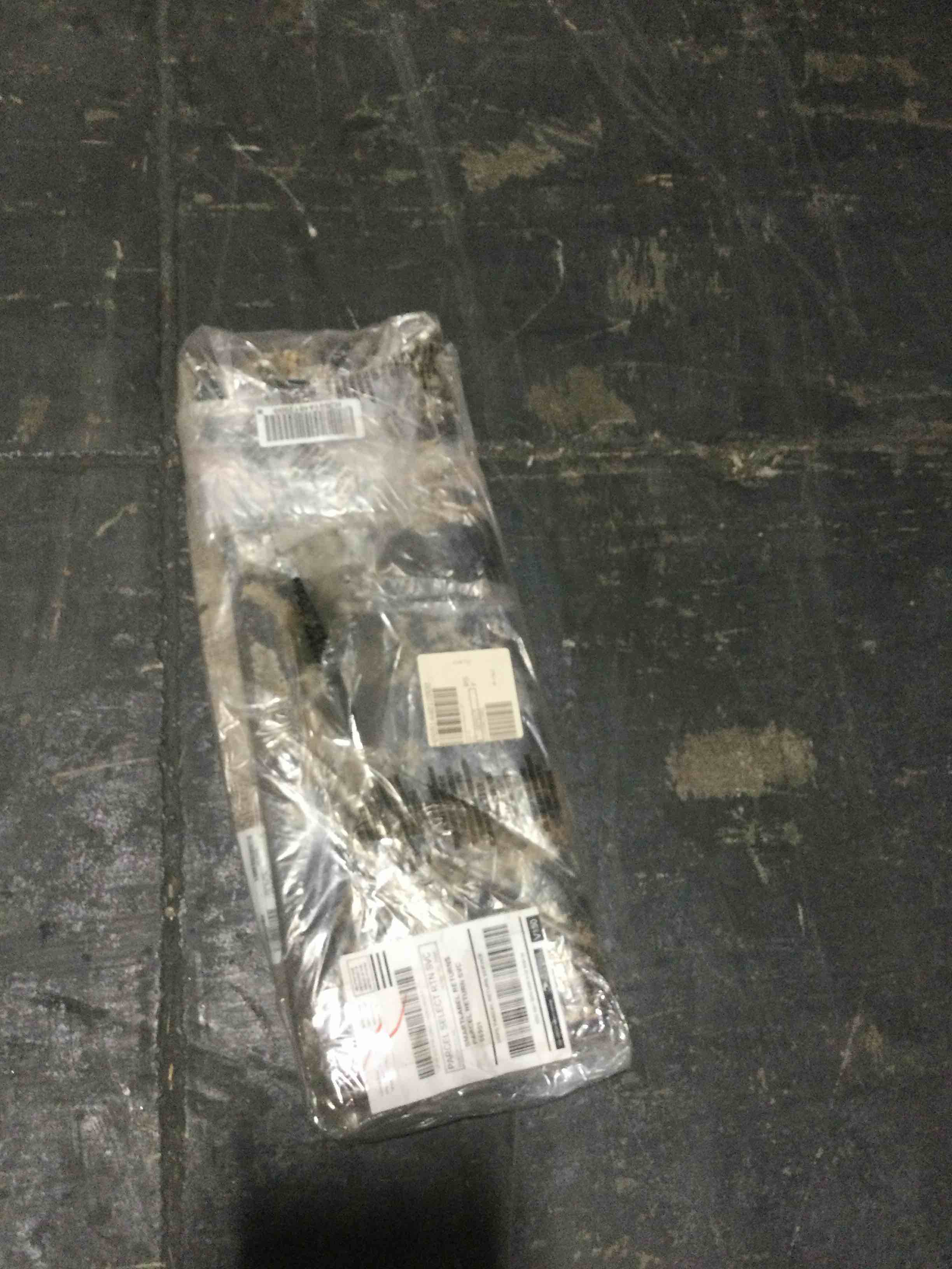 Condition photo showing New/Like New for Mohawk belgravia woven 24”x36” accent rug, black 