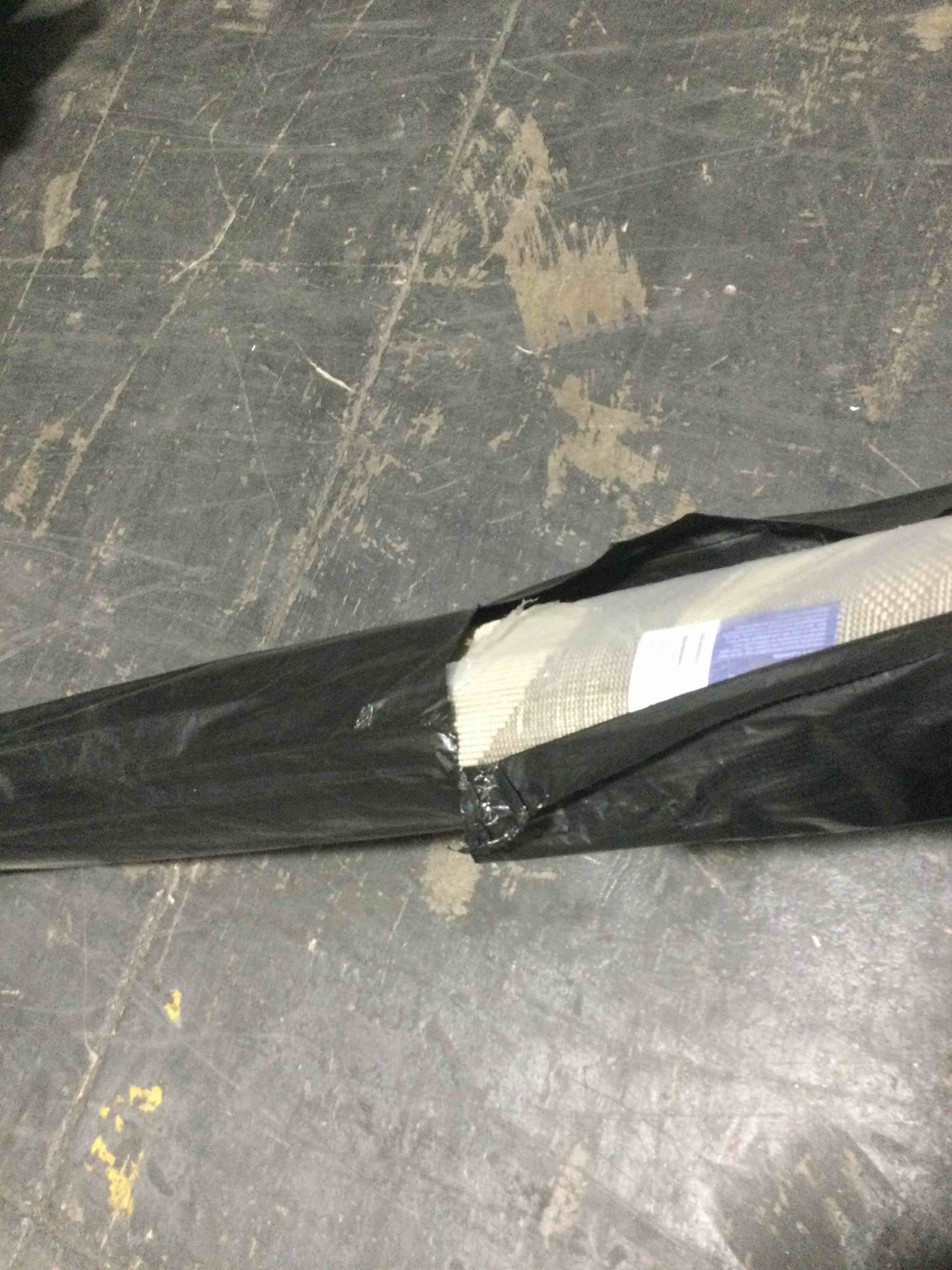 Condition photo showing New/Like New for ultimate innovations 94” round island escape in/outdoor rug, gray