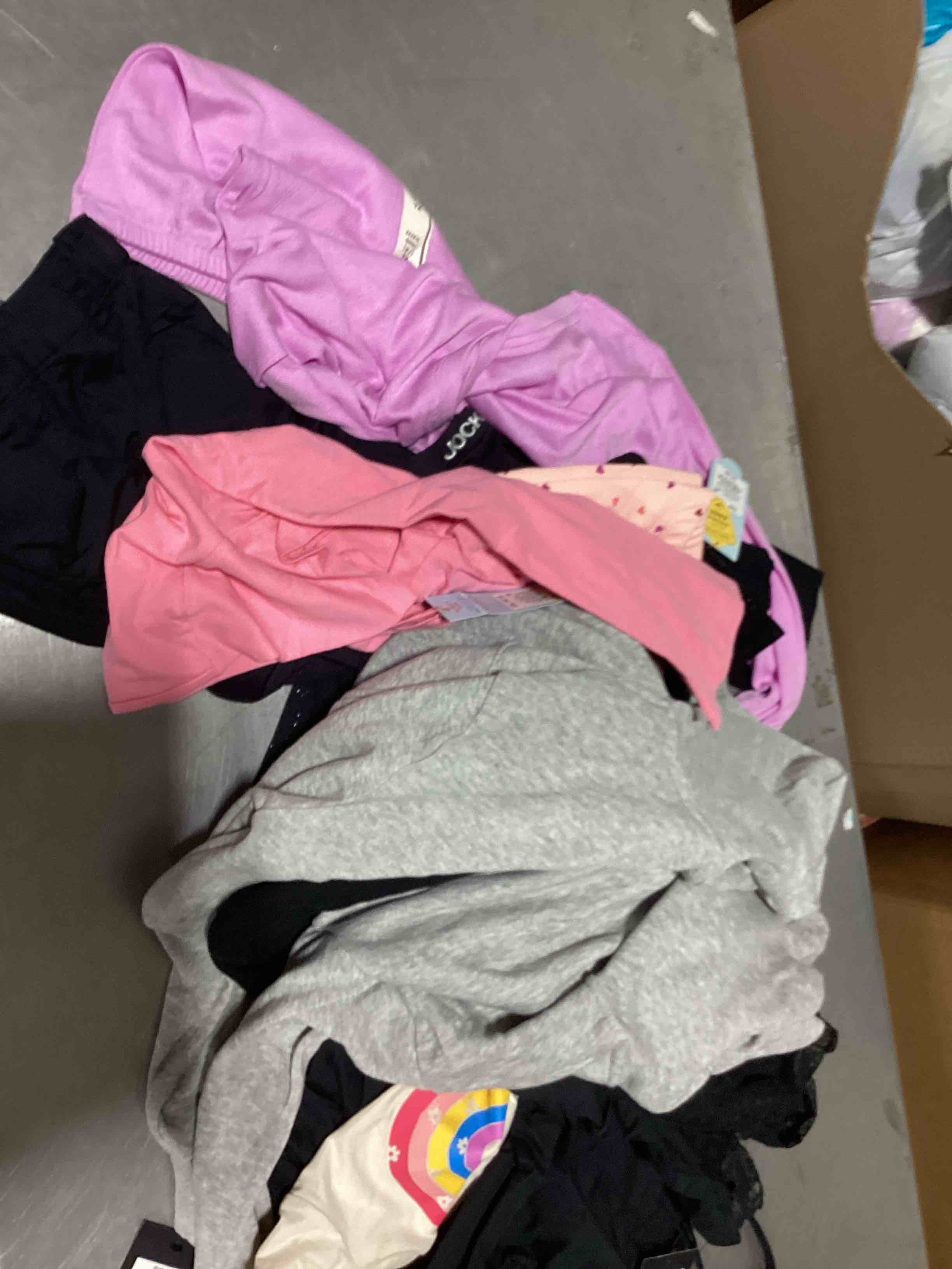 assorted new clothing different sizes and styles 