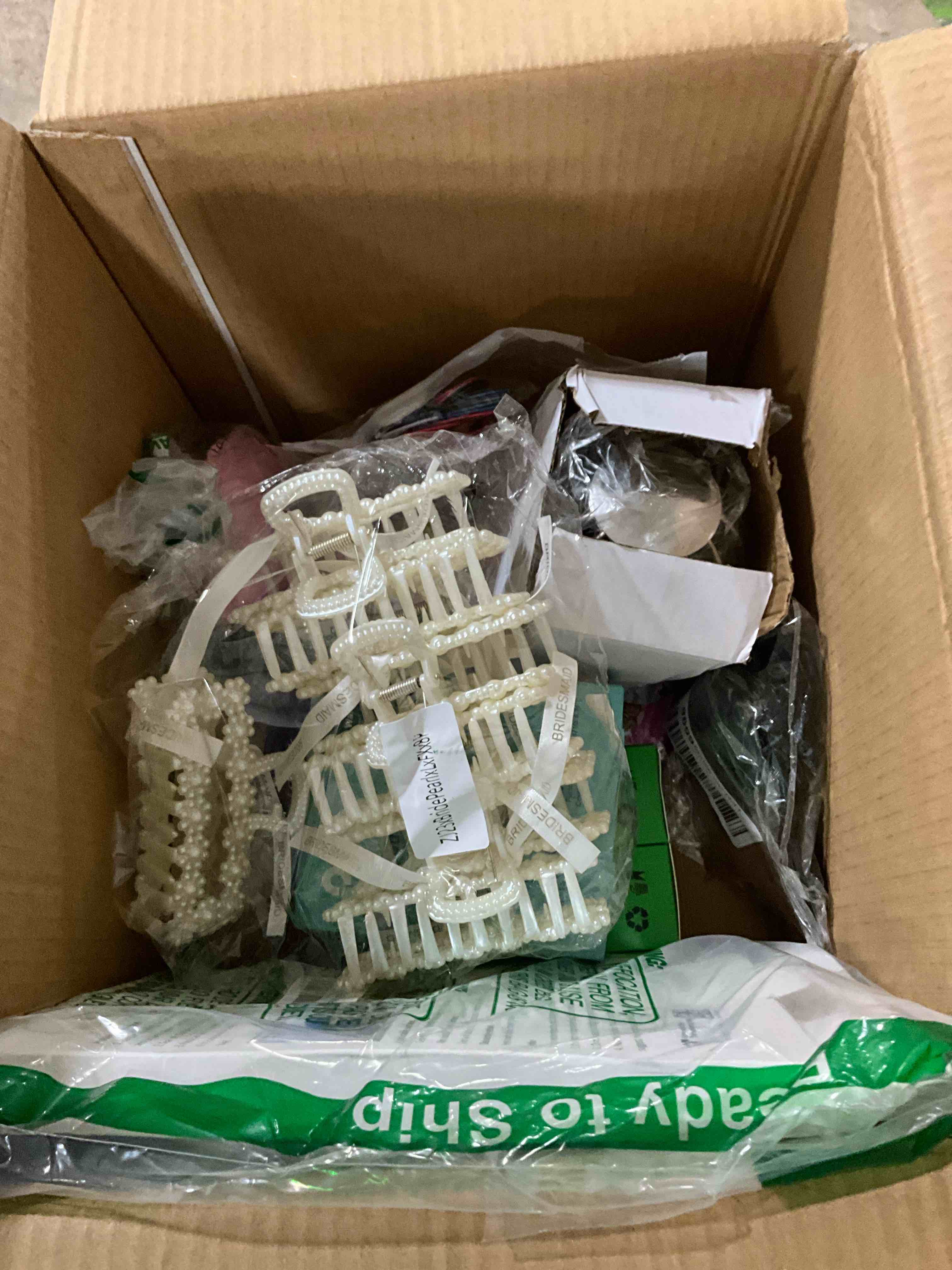 assorted items for example bride maid hair clippers and much more goodies 