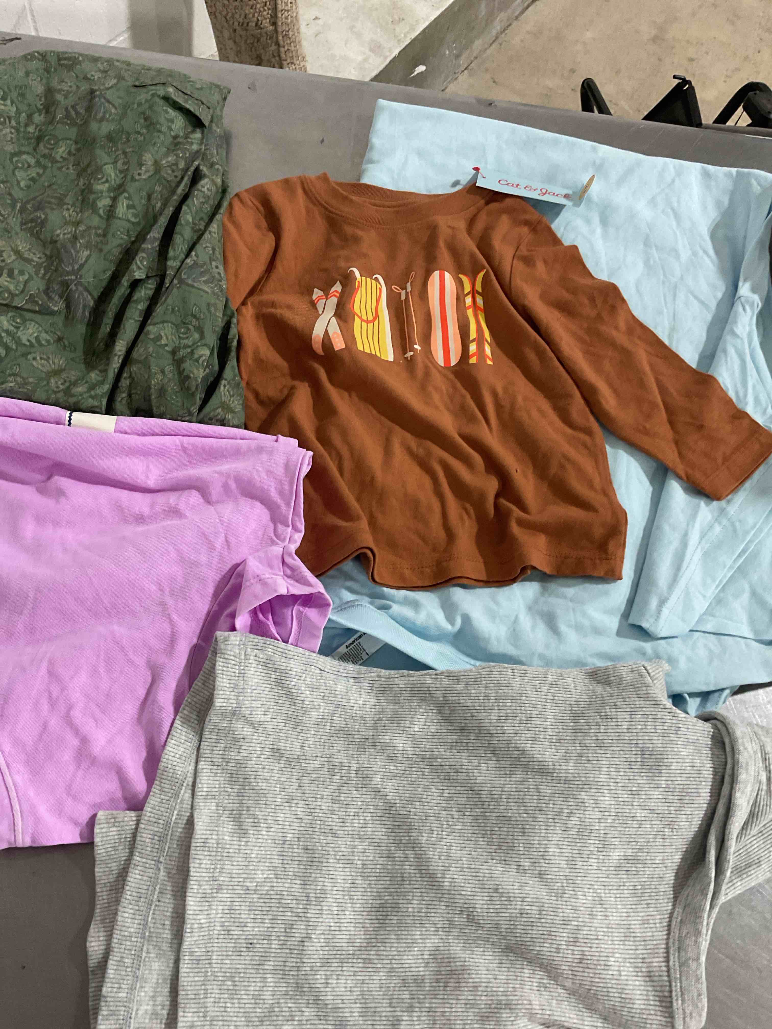 assorted clothes Different size color and style