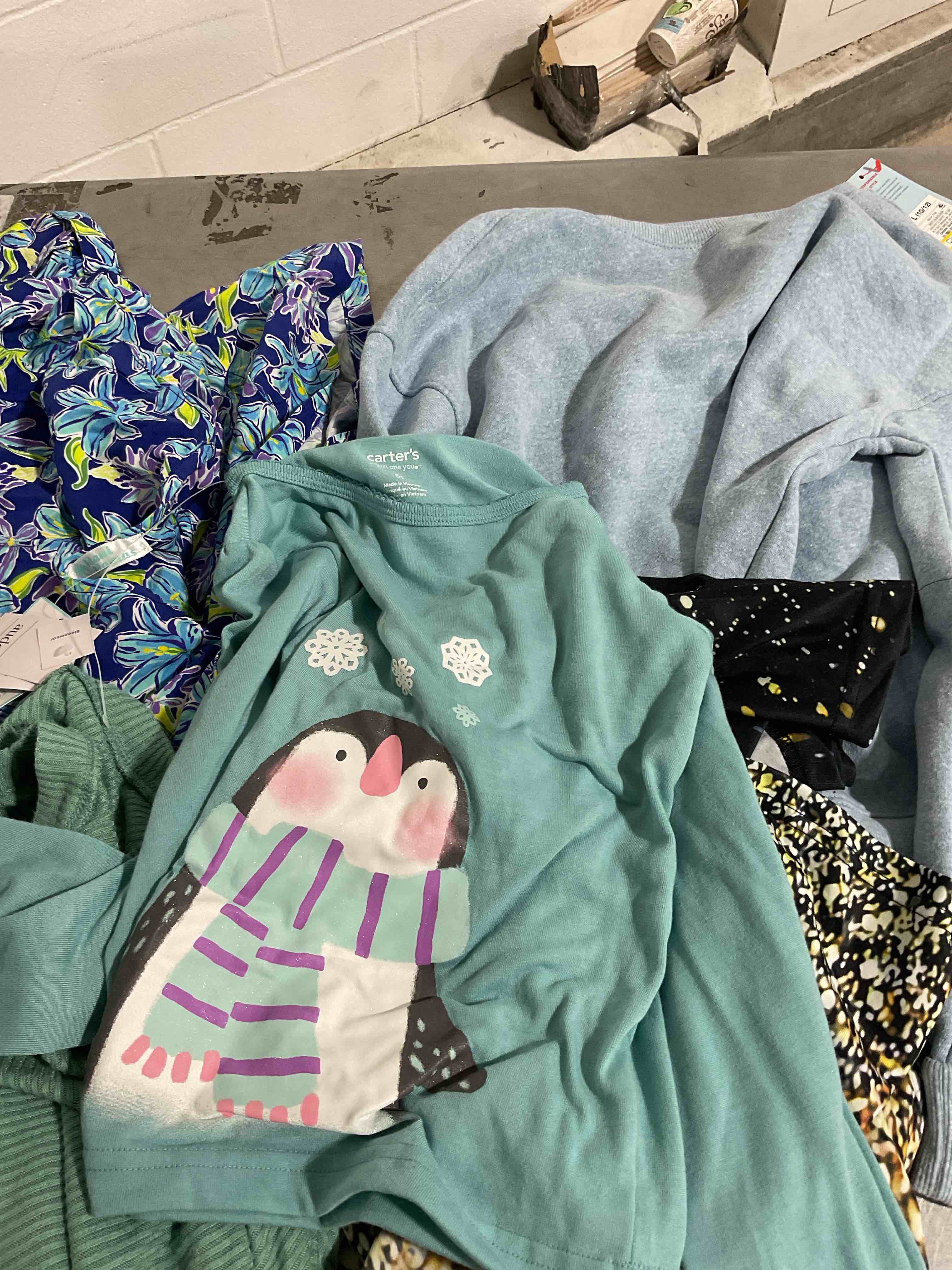 assorted clothes Different size color and style