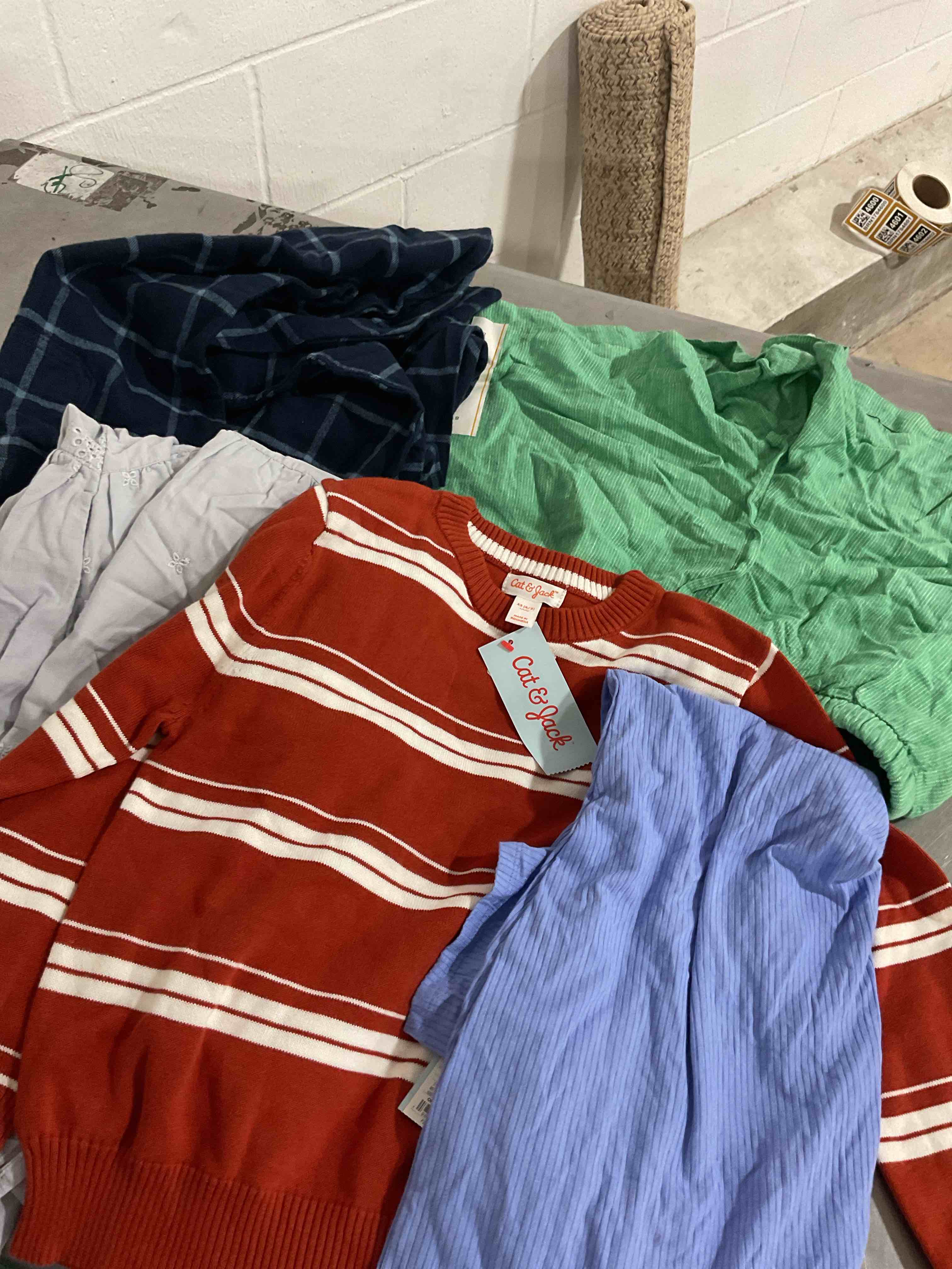 assorted clothes Different size color and style
