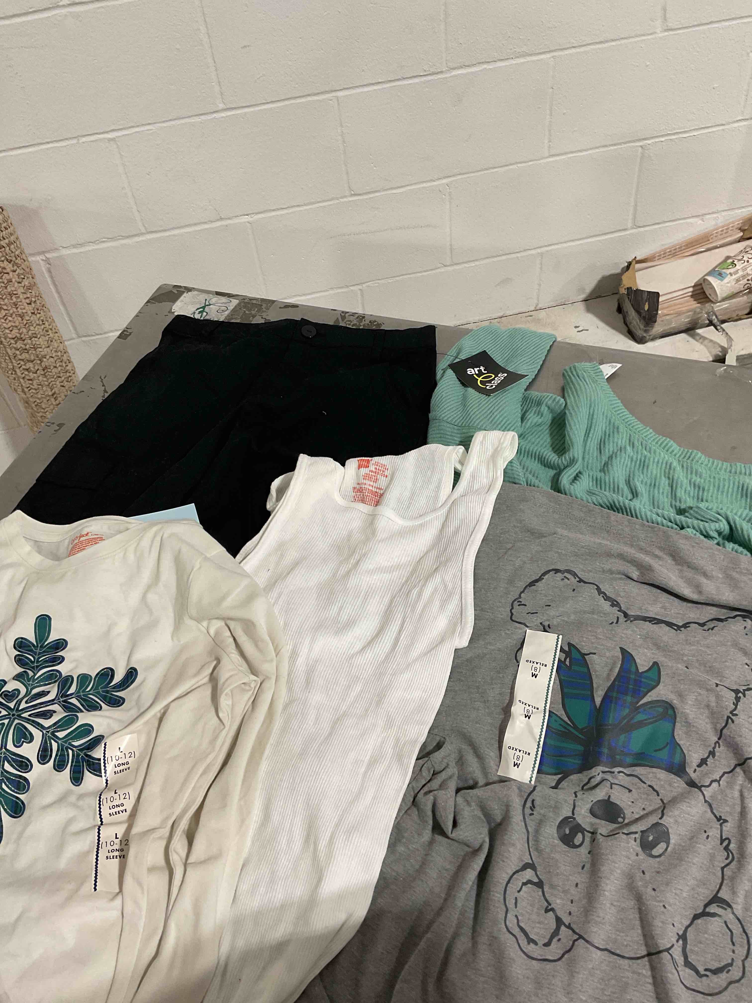 assorted clothes Different size color and style