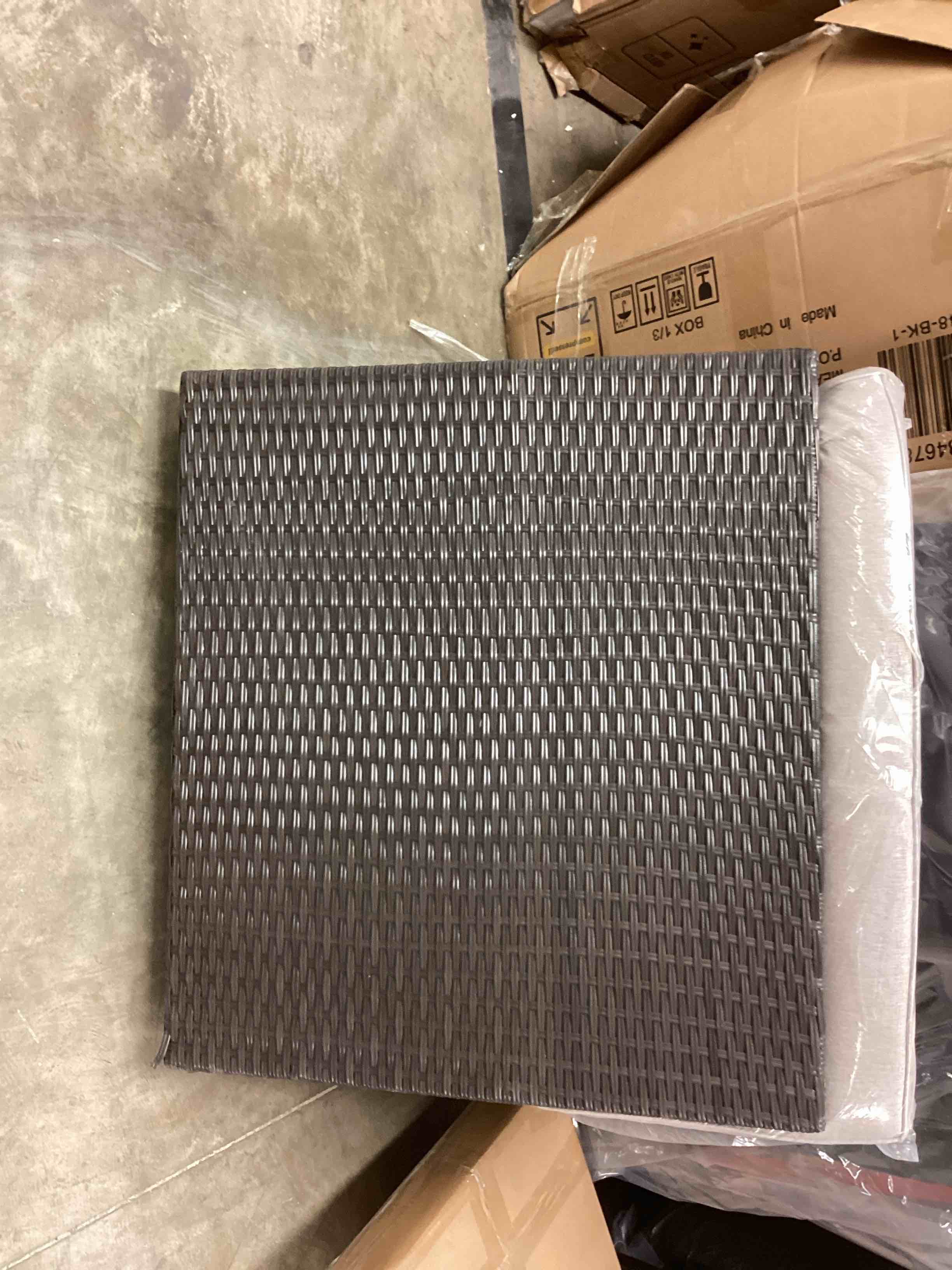(Incomplete only the backing to pick up) Backing of a patio chair.