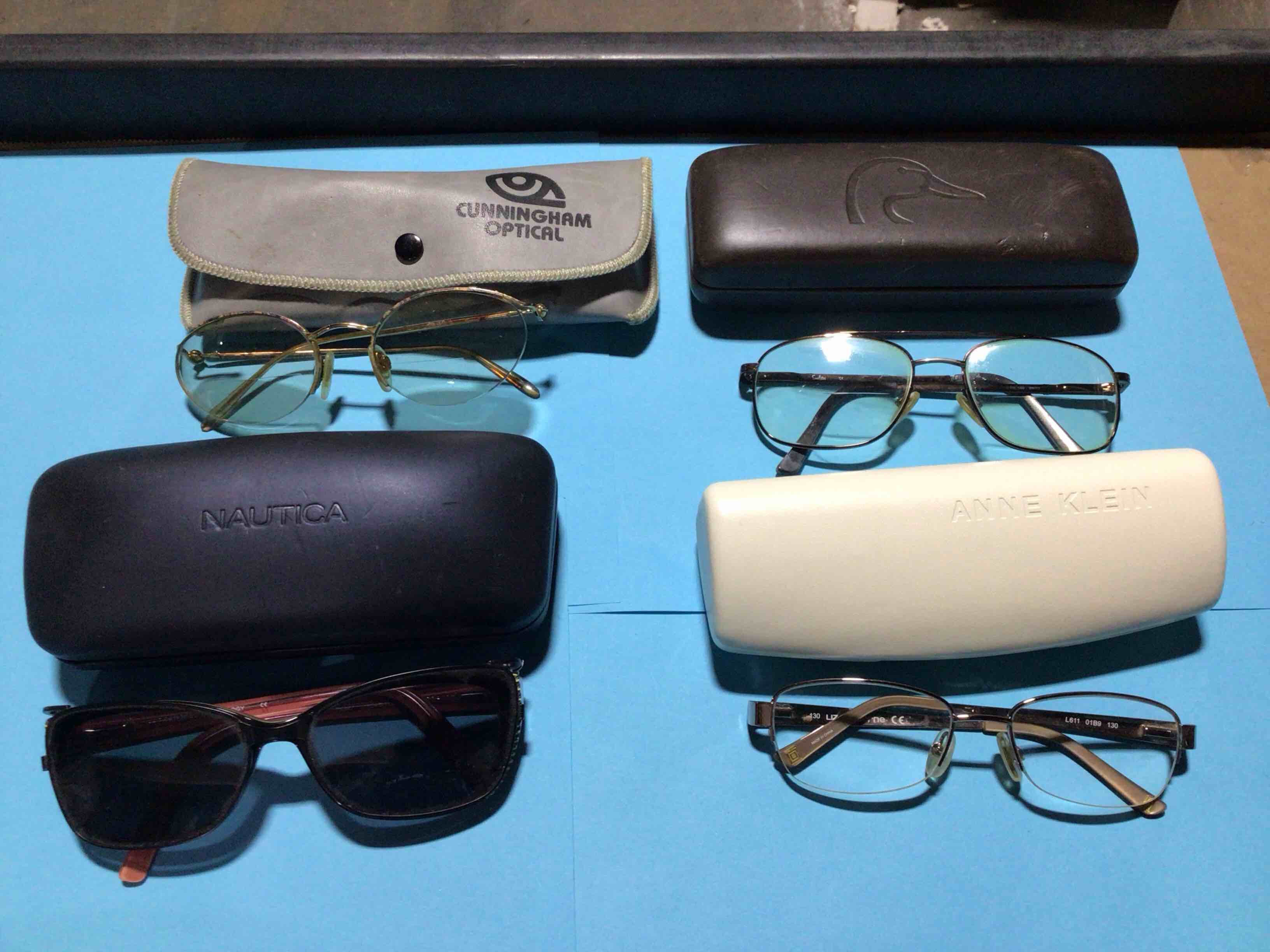 Condition photo showing As Is for Pack of 4 prescription glasses