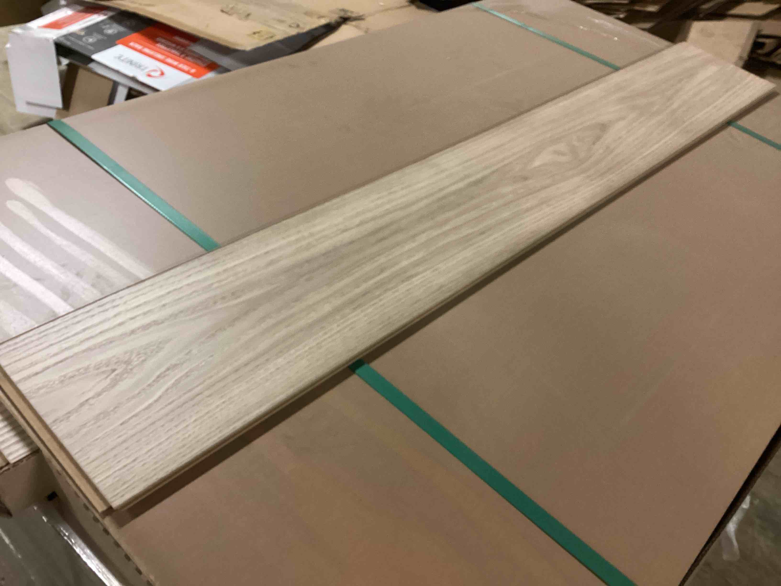 Condition photo showing As Is for 1179.12 sq.ft. of 8mm laminate flooring, your bid per sq.ft