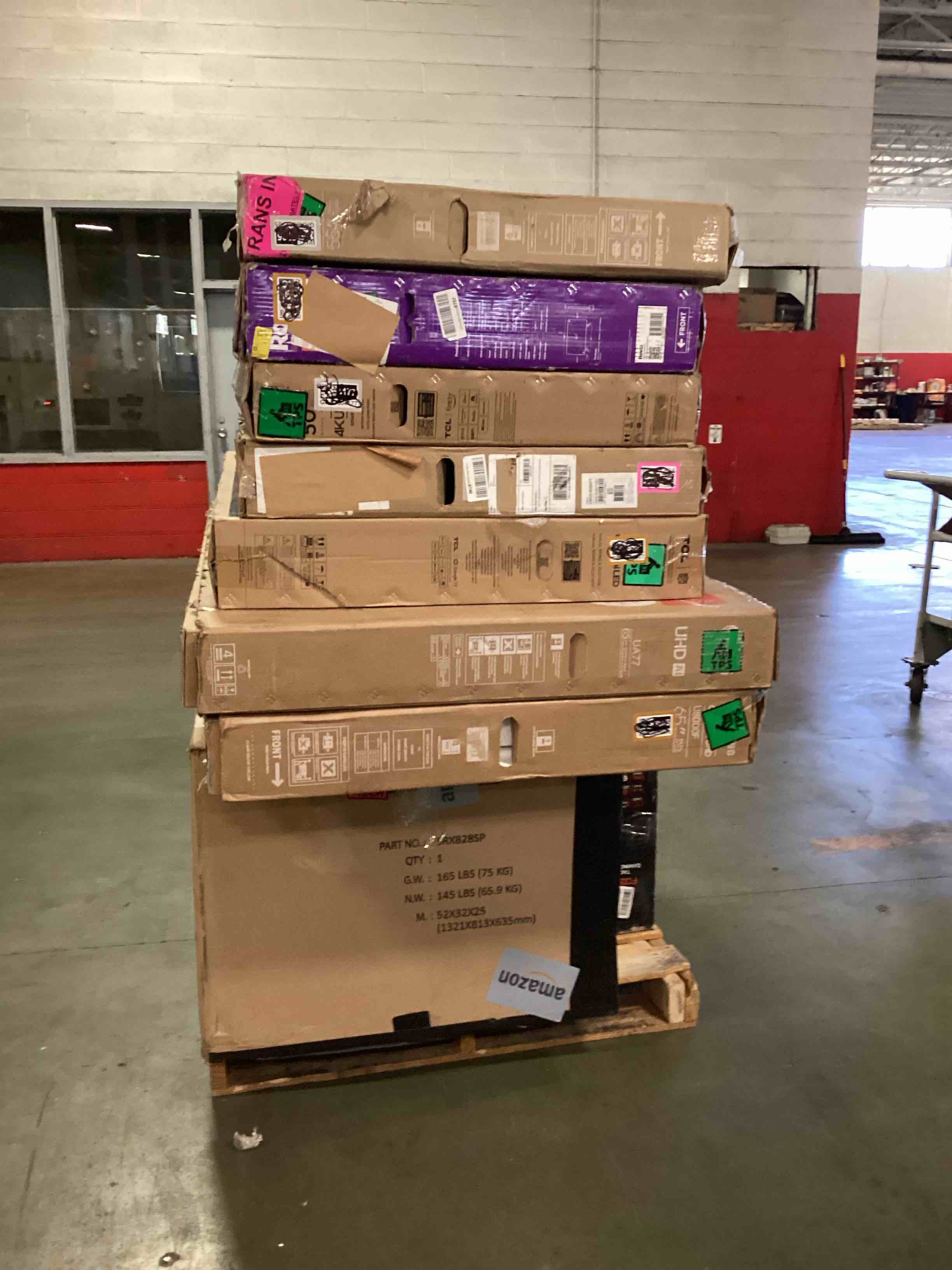 pallet of defective electronics for parts 
