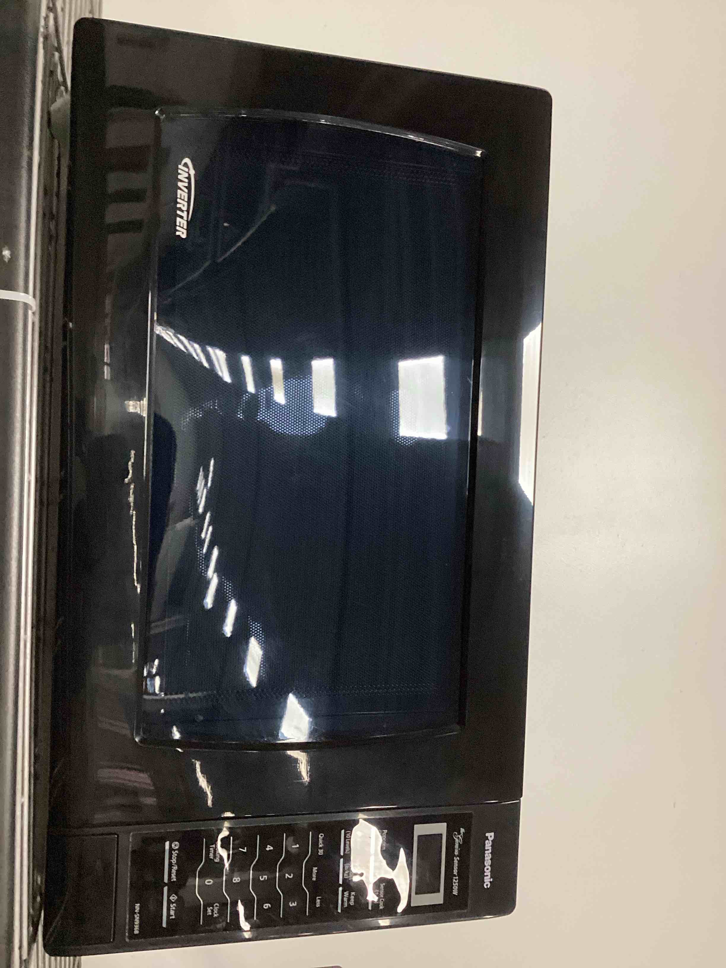 Condition photo showing As Is for 2.2 cu.ft. Inverter Microwave, 1250W - NN-SN936B