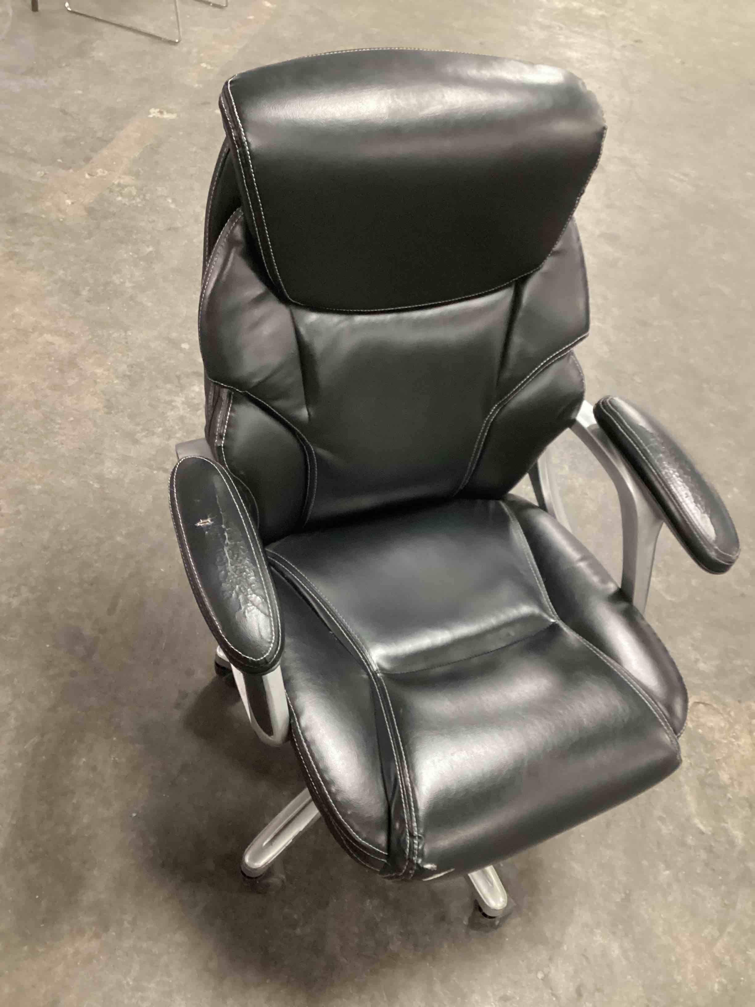Condition photo showing As Is for Serta Amplify Executive Office Chair with Faux Leather and Mesh, Adjustable Ergonomic Comfy Seat with Lumbar Support, Modern Computer DeskChairs, Swivel Rolling Wheels, Black