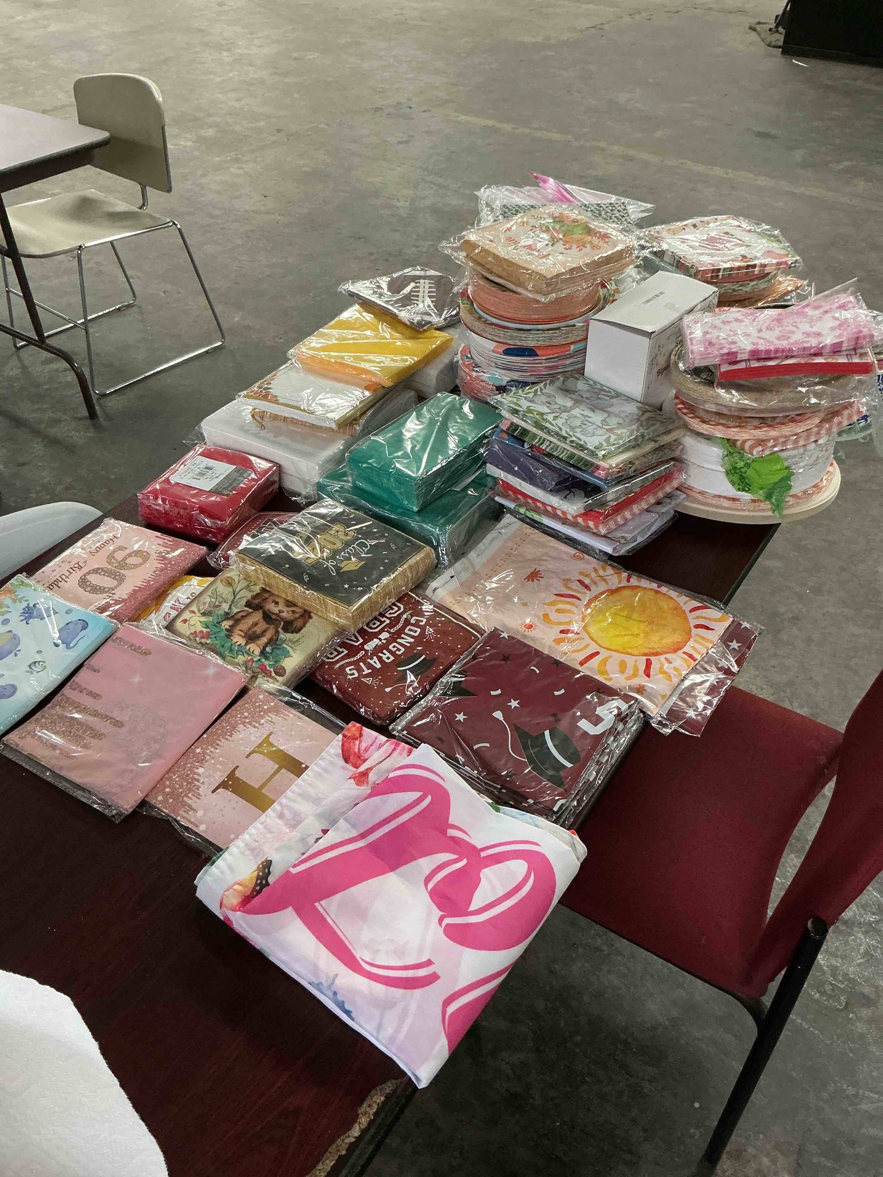 Condition photo showing As Is for Assorted Celebration/Decoration Supplies (May include a variety of styles, colors, and themes)