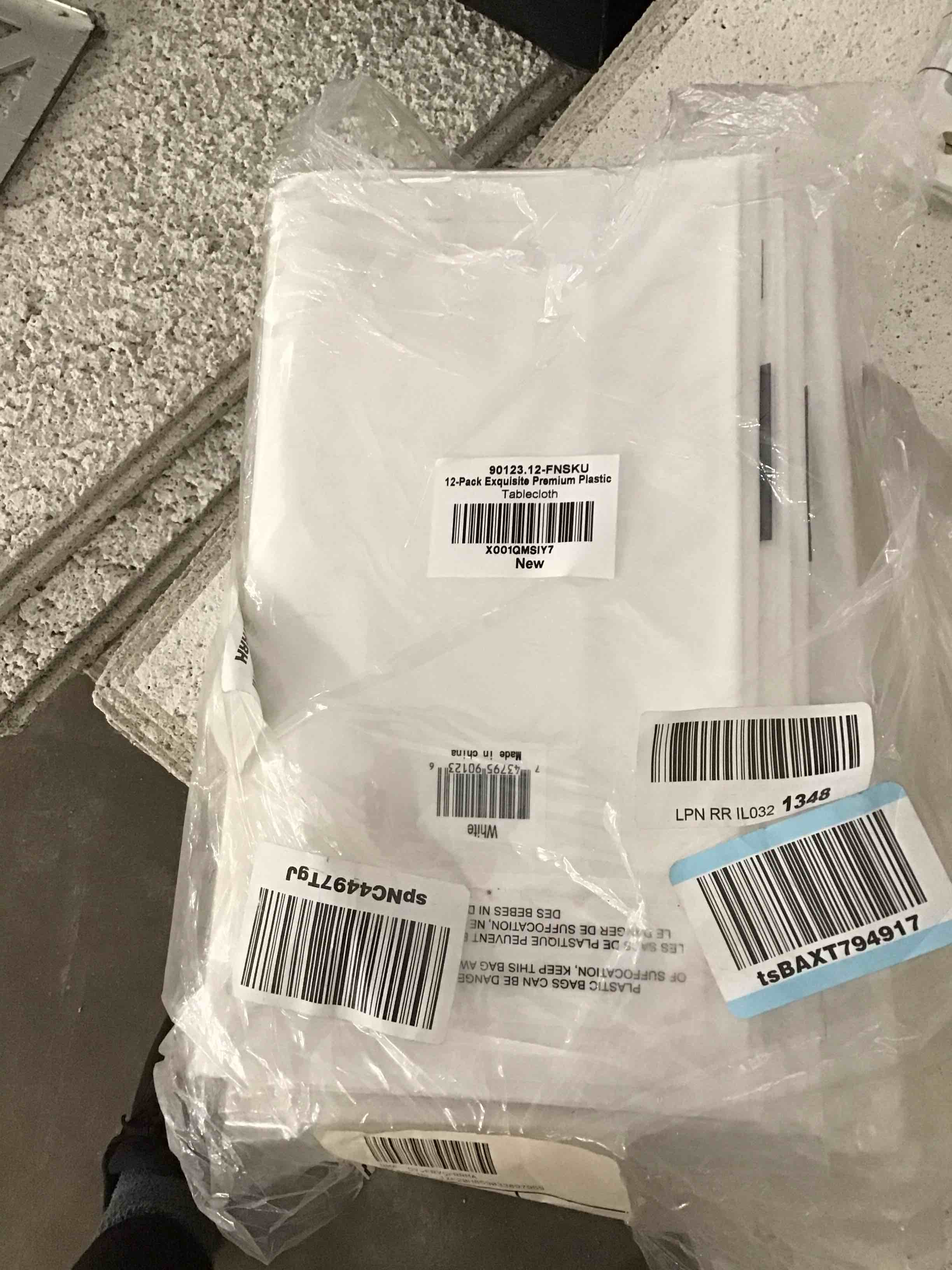 Condition photo showing Good Condition for Exquisite 8-Pack Premium Plastic Tablecloth 54 Inch. x 108 Inch. Rectangle Table Cover-White 54in. X 108in. Rectangle White