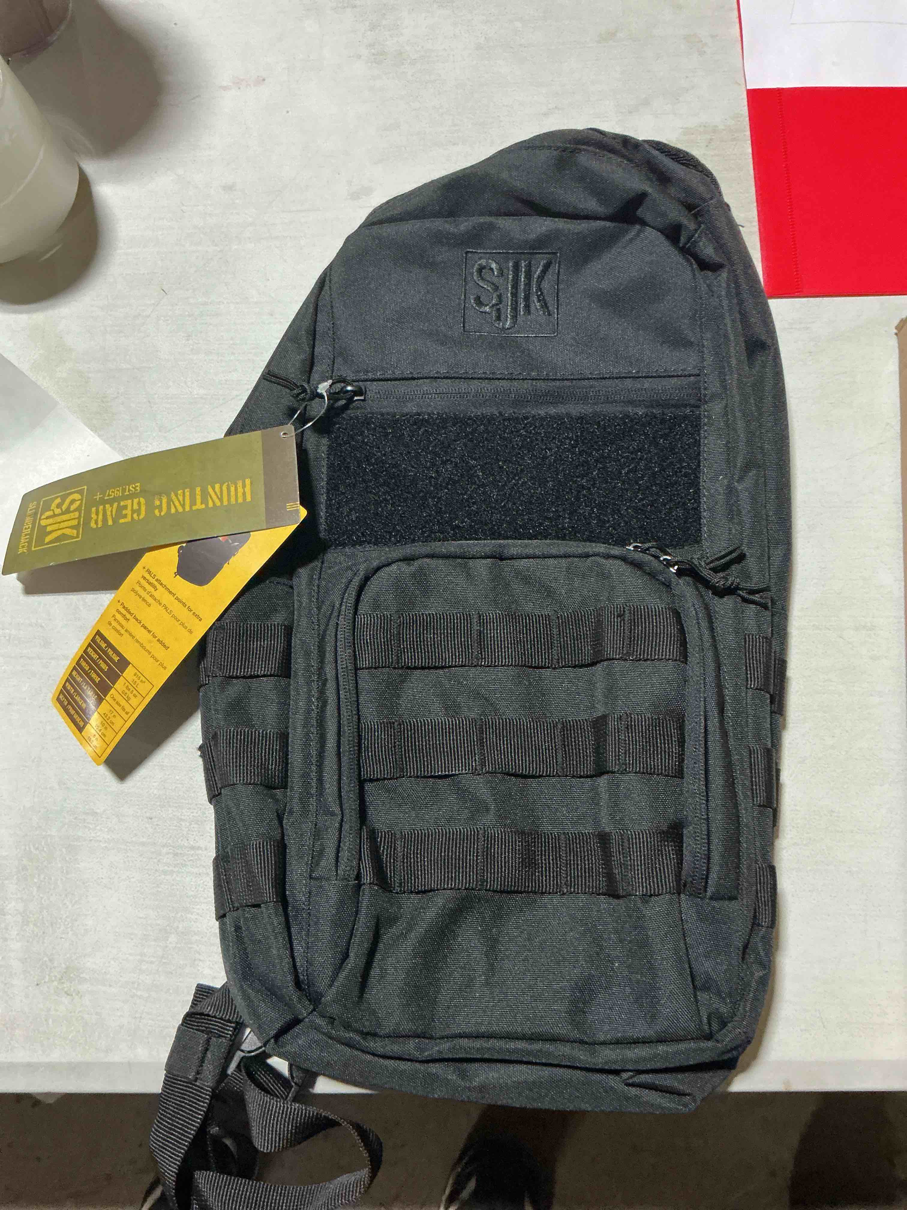 Condition photo showing New/Like New for reign 15 sling black