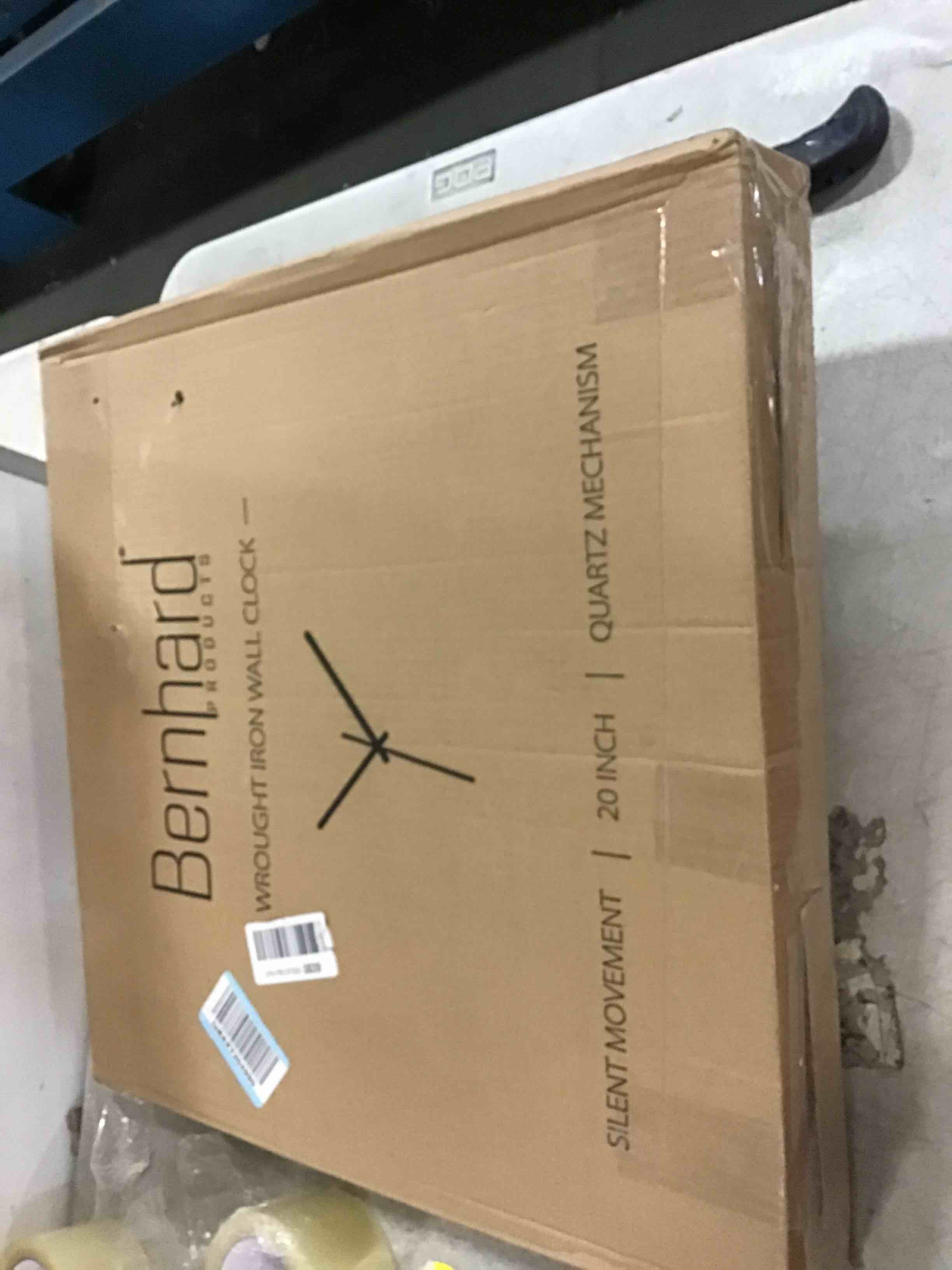 Condition photo showing Good Condition for Bernhard Products Extra Large Wall Clock 20 Inch Decorative Wrought Iron, Silent Quartz Industrial Gears Black Rustic Metal Roman Numeral European Steampunk Cog Vintage Distressed Details, Battery