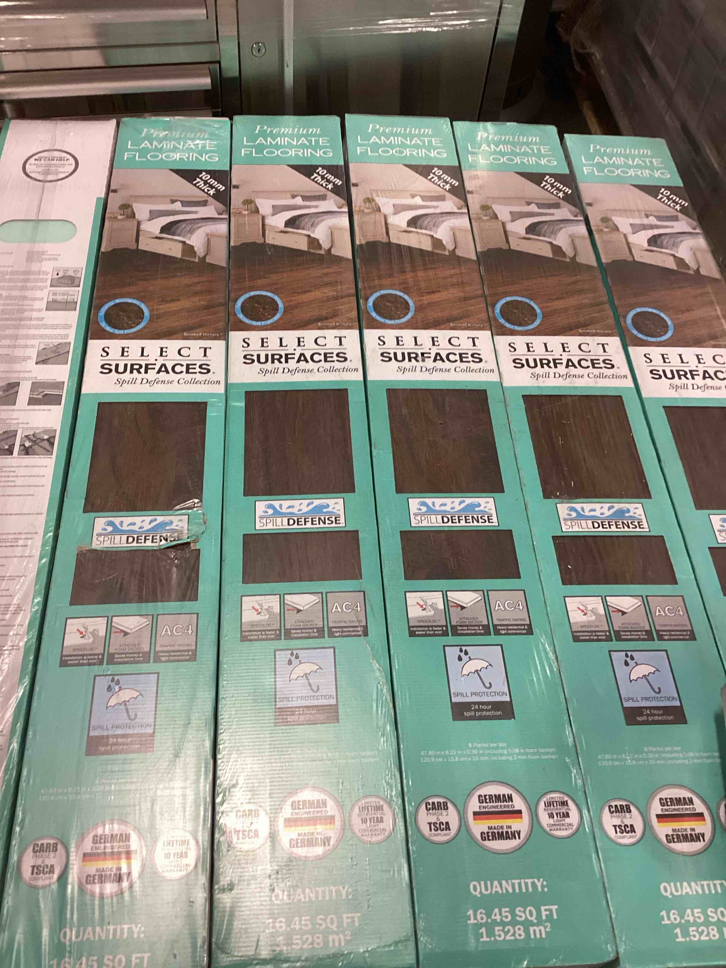 Select Surface Smoke Hickory Laminate Flooring 16.45 Sq,ft per box 20 Boxes for pick up 329 sq.ft you bid per sq.ft 